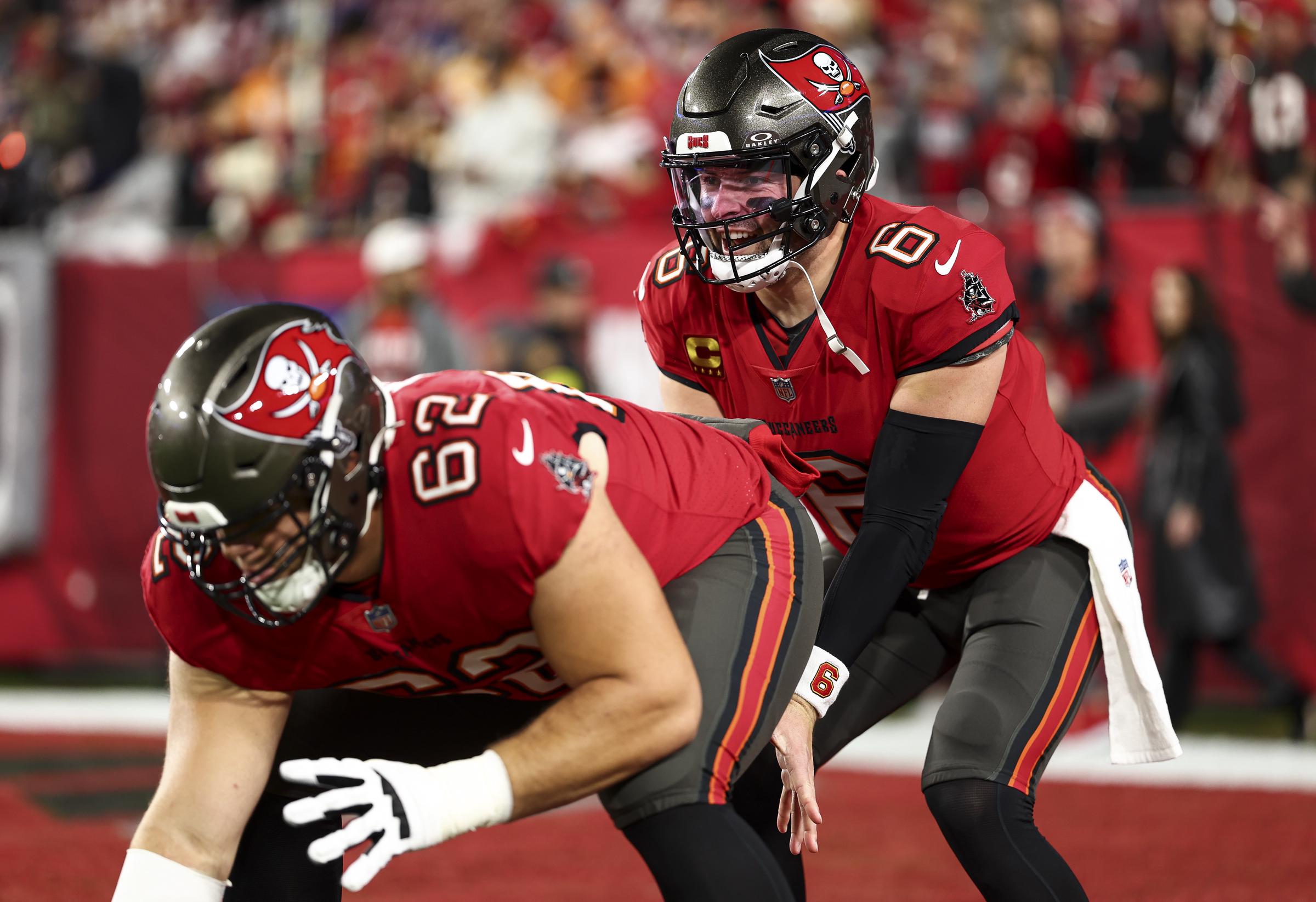 Baker Mayfield #6 of the Tampa Bay Buccaneers warms up with Graham Barton #62 on January 12, 2025, in Tampa, Florida | Source: Getty Images