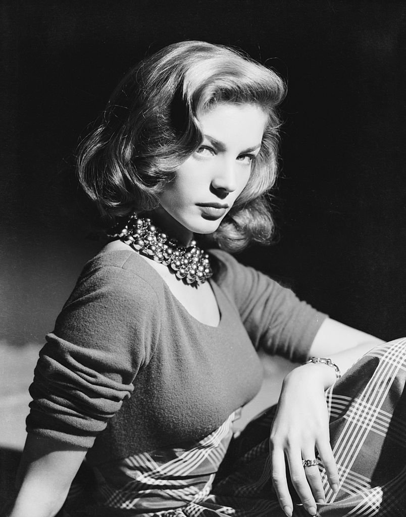 circa 1945: American screen star Lauren Bacall wearing an ornate beaded necklace. | Source: Getty Images