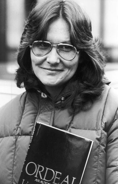 Linda Lovelace Poses With Her Autobiography "Ordeal" April 4, 1981, In England. | Source: Getty Images.