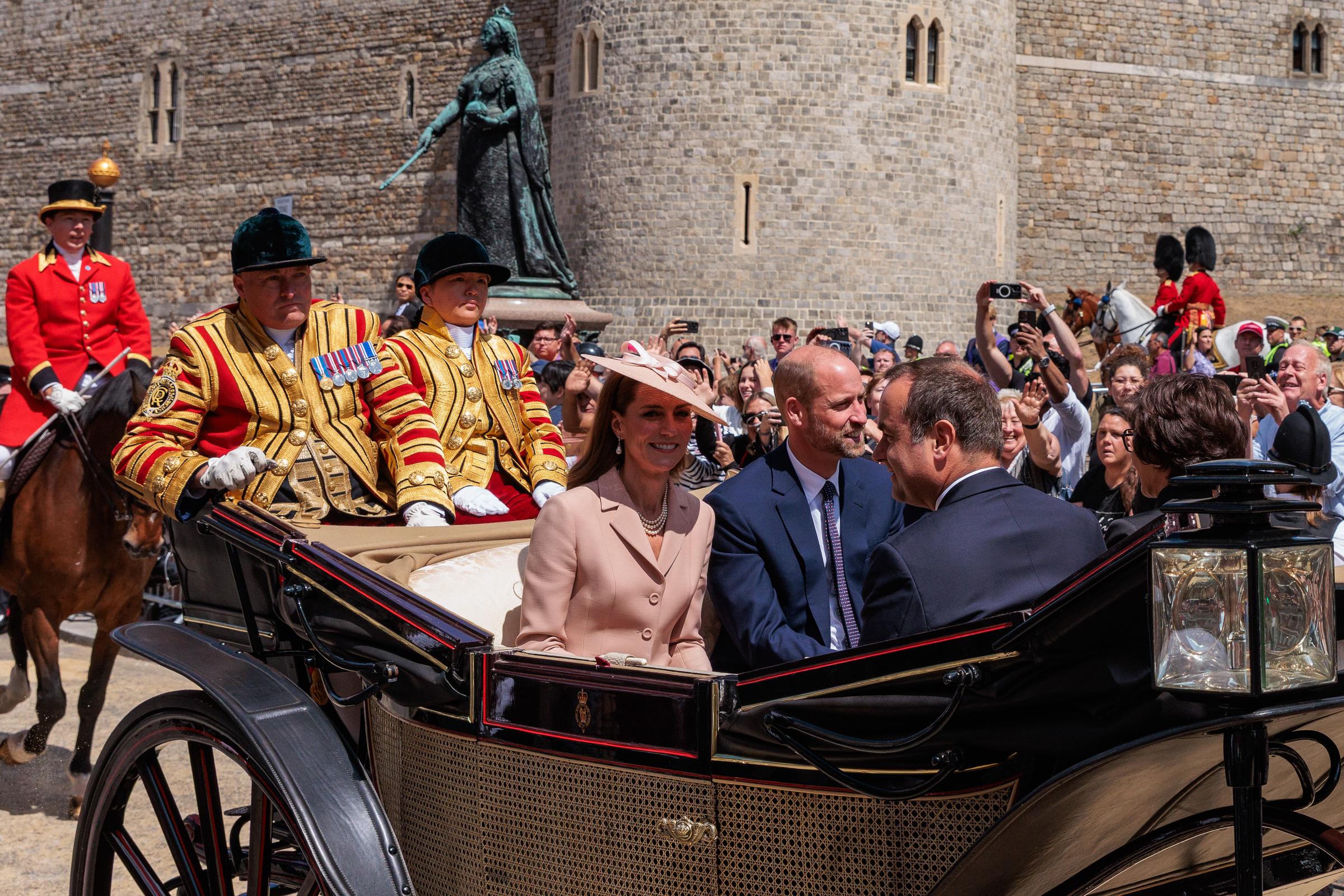 Princess Catherine and Prince William shared smiles aboard a ceremonial carriage en route to Windsor Castle, where they took part in the official welcome for the French delegation during the state visit to the United Kingdom.