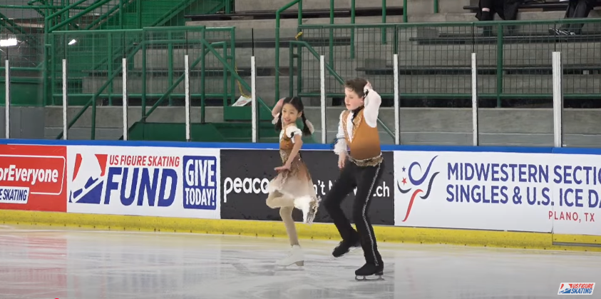 Skaters Sean Kay, and Angela Yang during a skating competition from a video posted on November 20, 2024 | Source: YouTube/@USFigureSkating