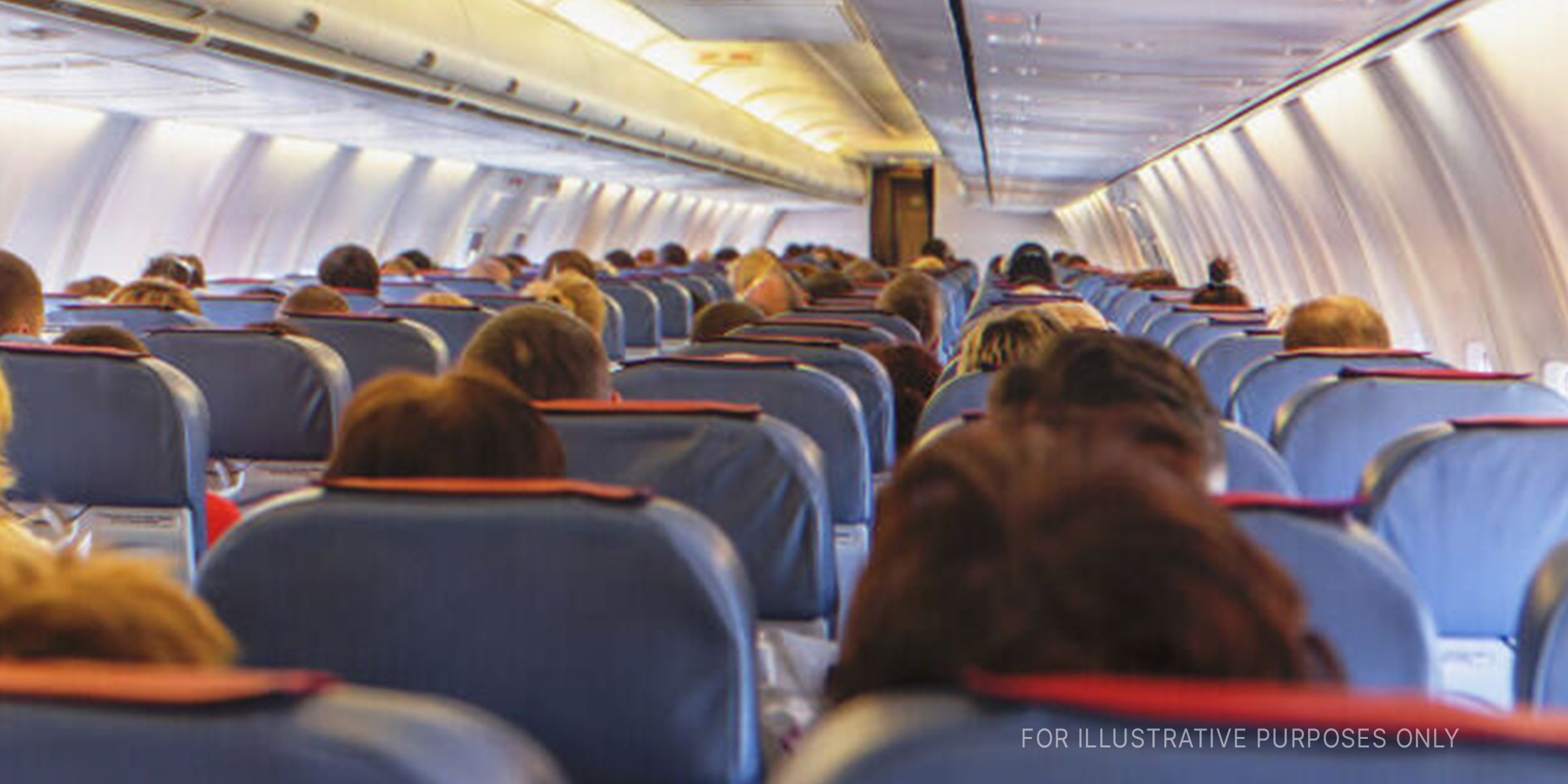 Passengers in an airplane | Source: Getty Images