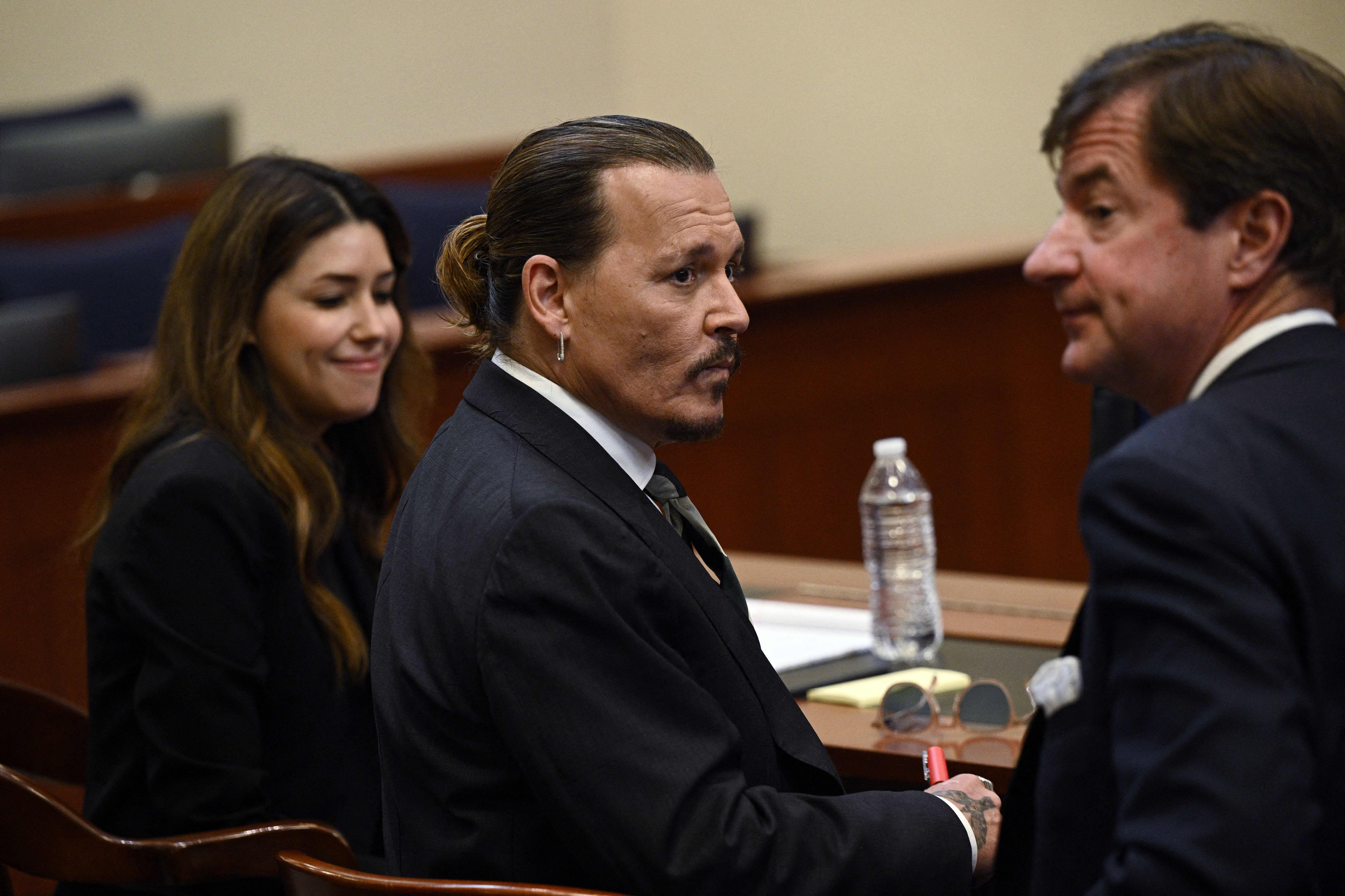 Johnny Depp sits in the courtroom at the Fairfax County Circuit Courthouse in Fairfax, Virginia, for his defamation trial on April 26, 2022. | Source: Getty Images