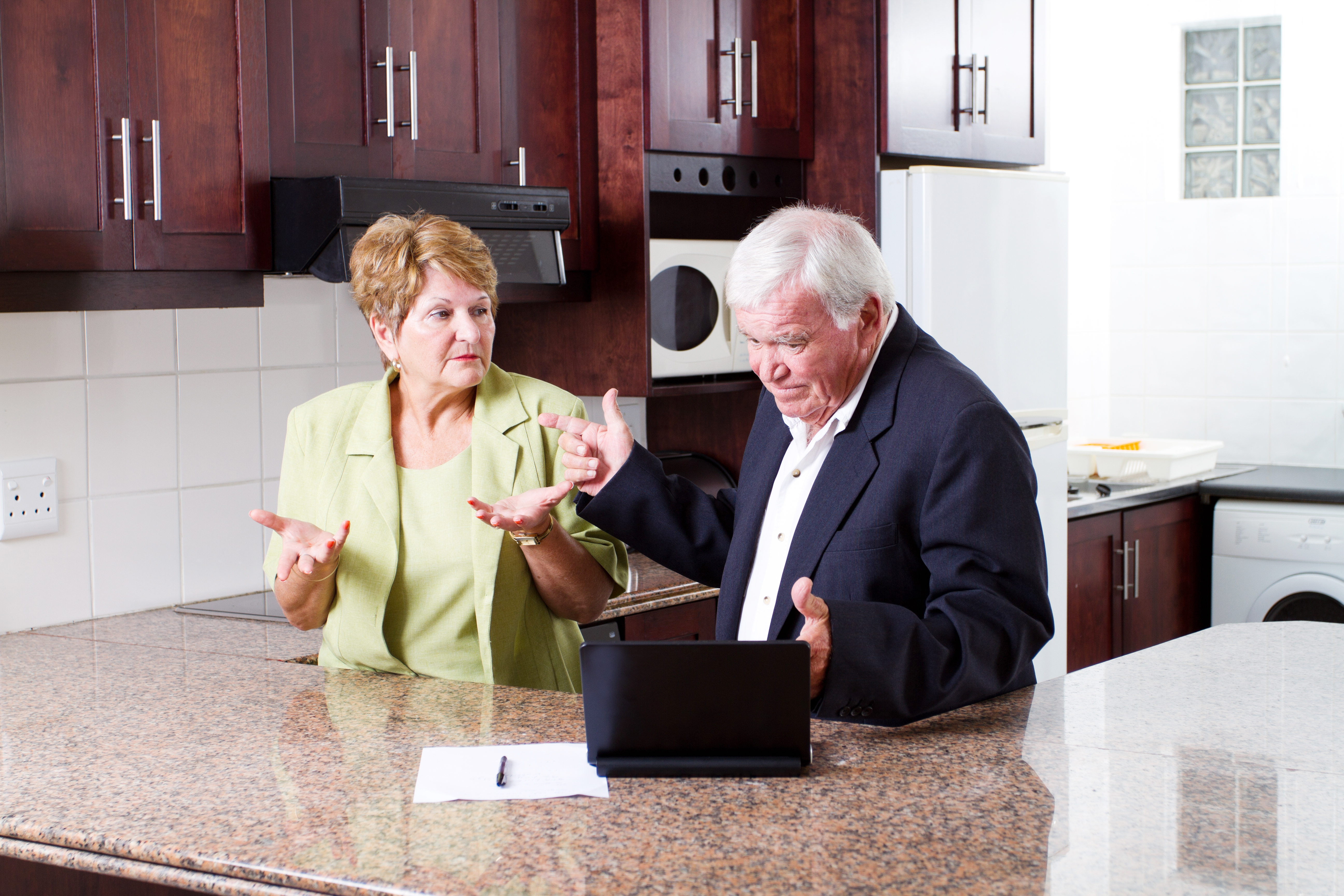An elderly couple arguing | Source: Shutterstock