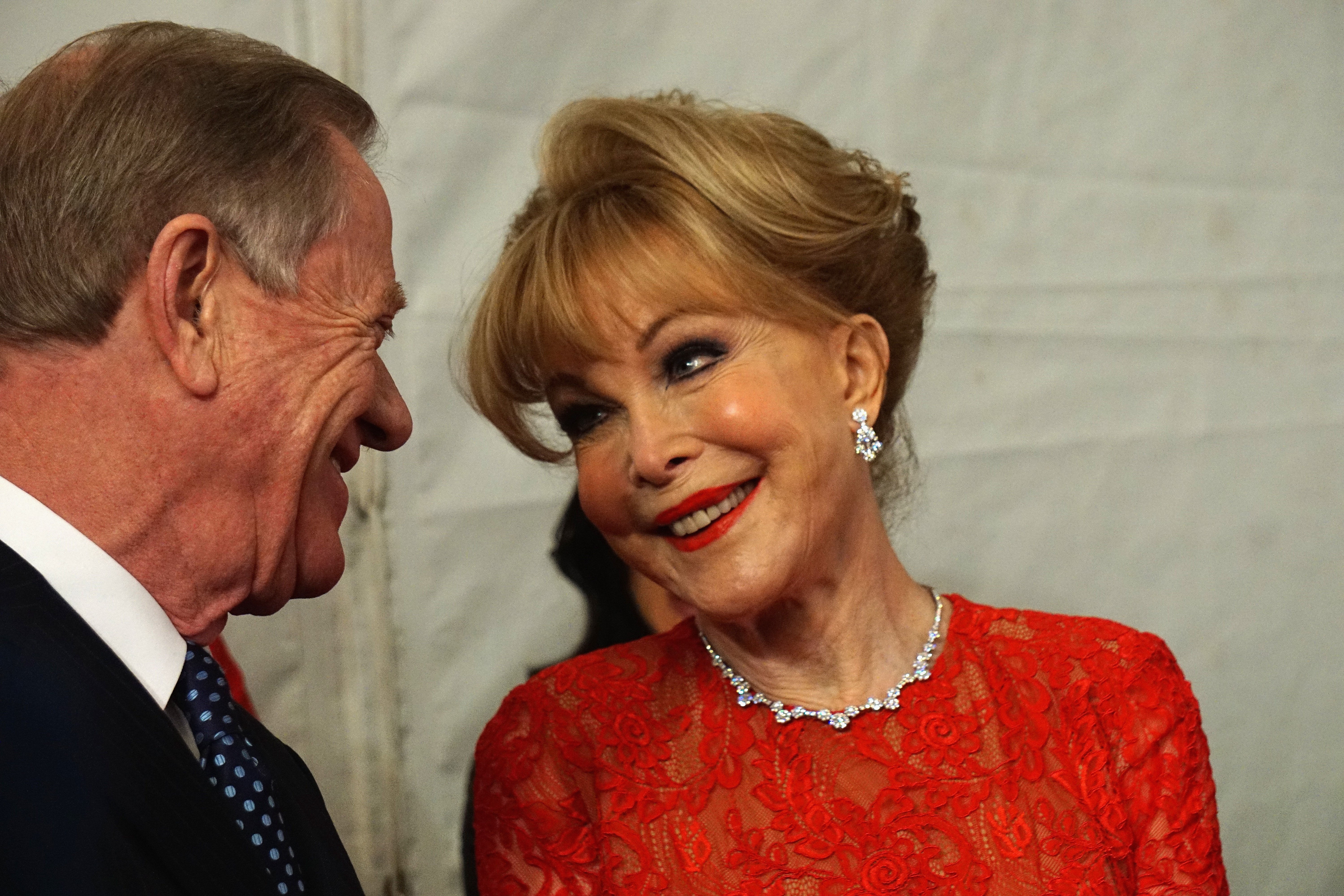 Barbara Eden and husband Jon Eicholtz attend the Go Red For Women Red Dress Collection 2015 presented by Macy's fashion show during Mercedes-Benz Fashion Week Fall 2015 at Lincoln Center on February 12, 2015 in New York City | Source: Getty Images 