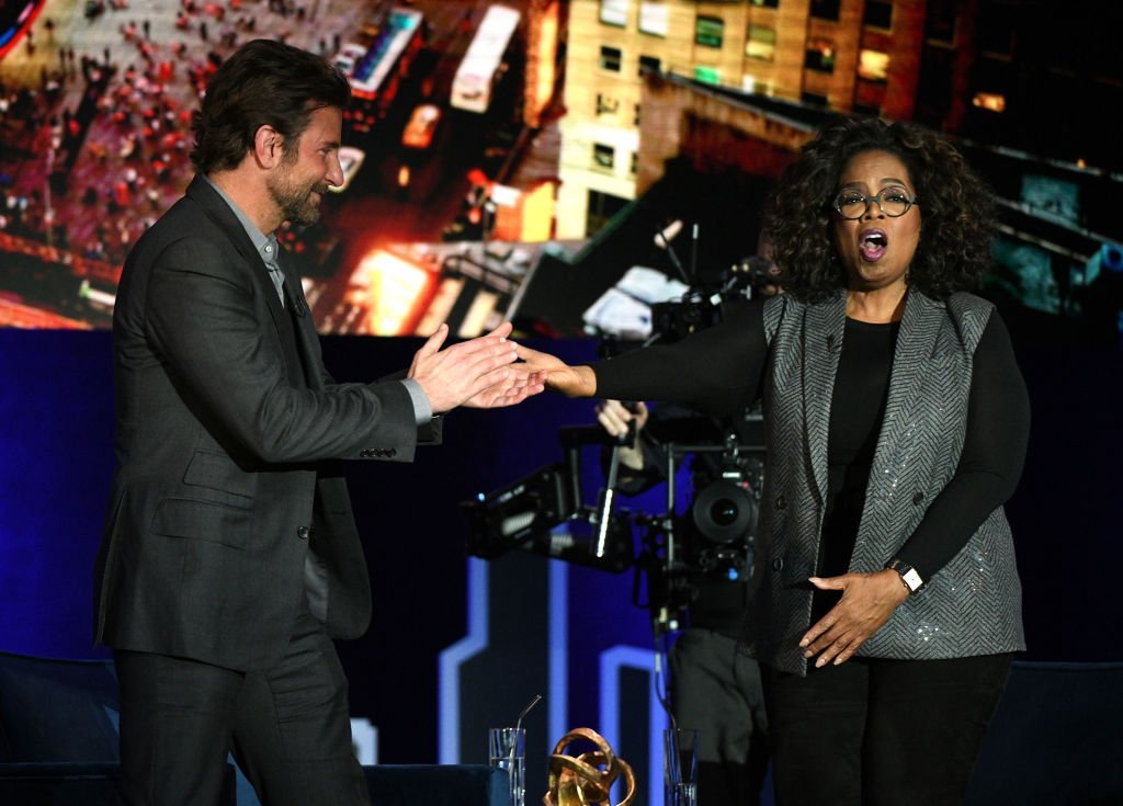 Bradley Cooper and Oprah Winfrey speak onstage during Oprah's SuperSoul Conversations at PlayStation Theater | Photo: Getty Images