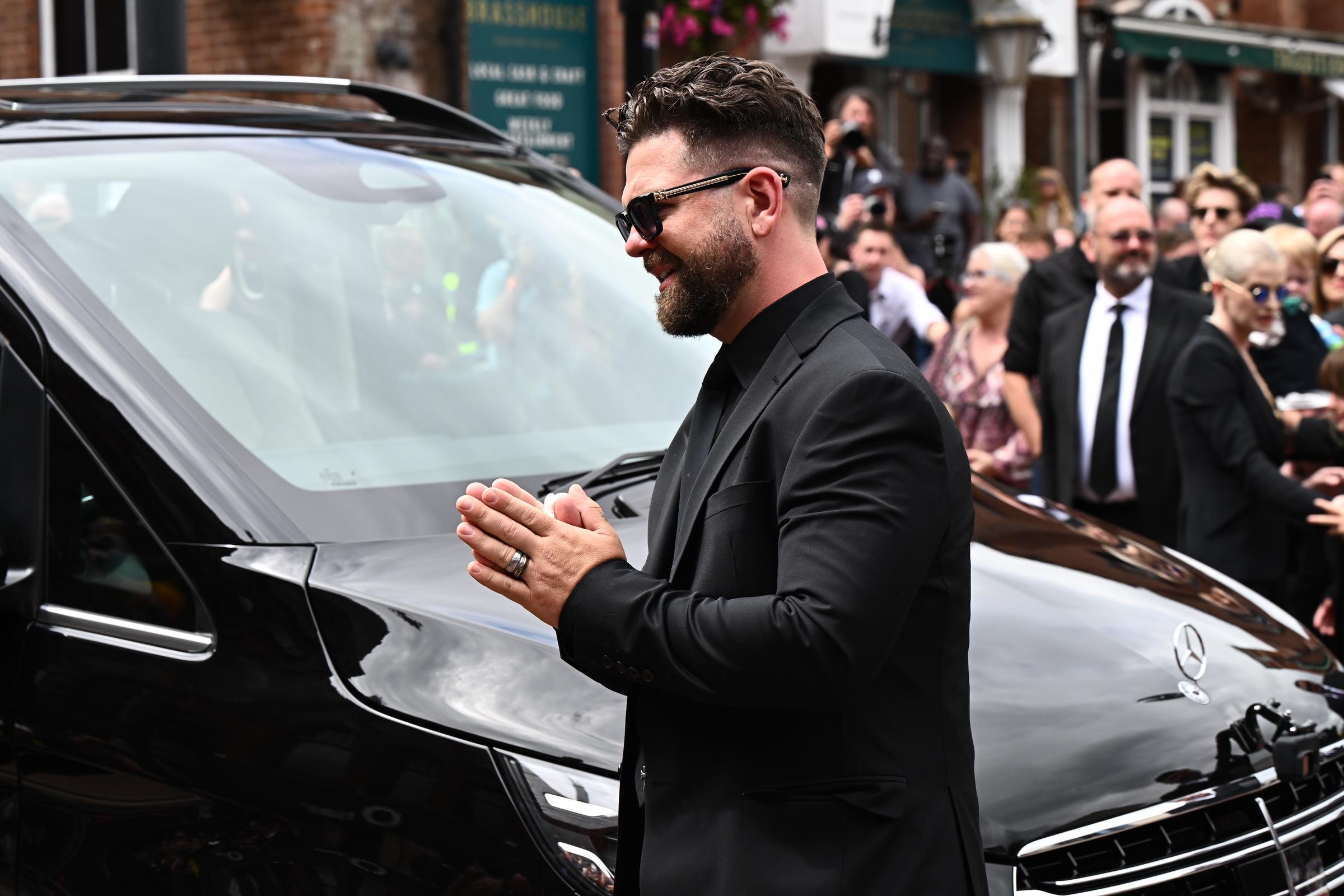 Jack Osbourne speaks with fans at his late father's funeral procession in Birmingham, England on July 30, 2025. | Source: Getty Images