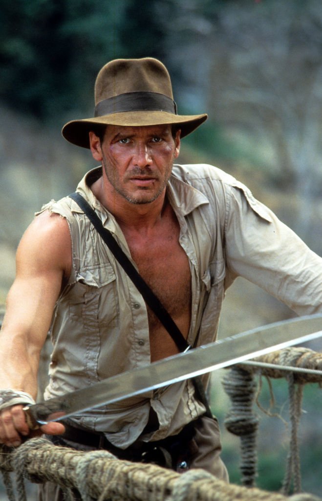 Harrison Ford in a scene from the film 'Indiana Jones And The Temple Of Doom', 1984 | Photo: Getty Images