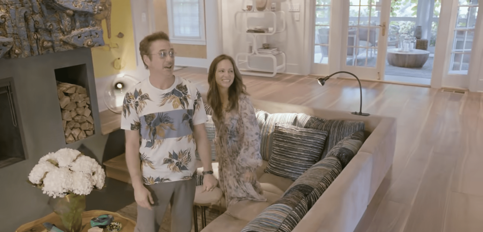 Robert Downey and his wife Susan showing off the furniture in their home. | Photo: YouTube/ArchitecturalDigest