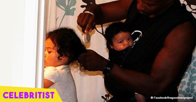 Viral photo of black father caring for interracial daughters draws racist remarks