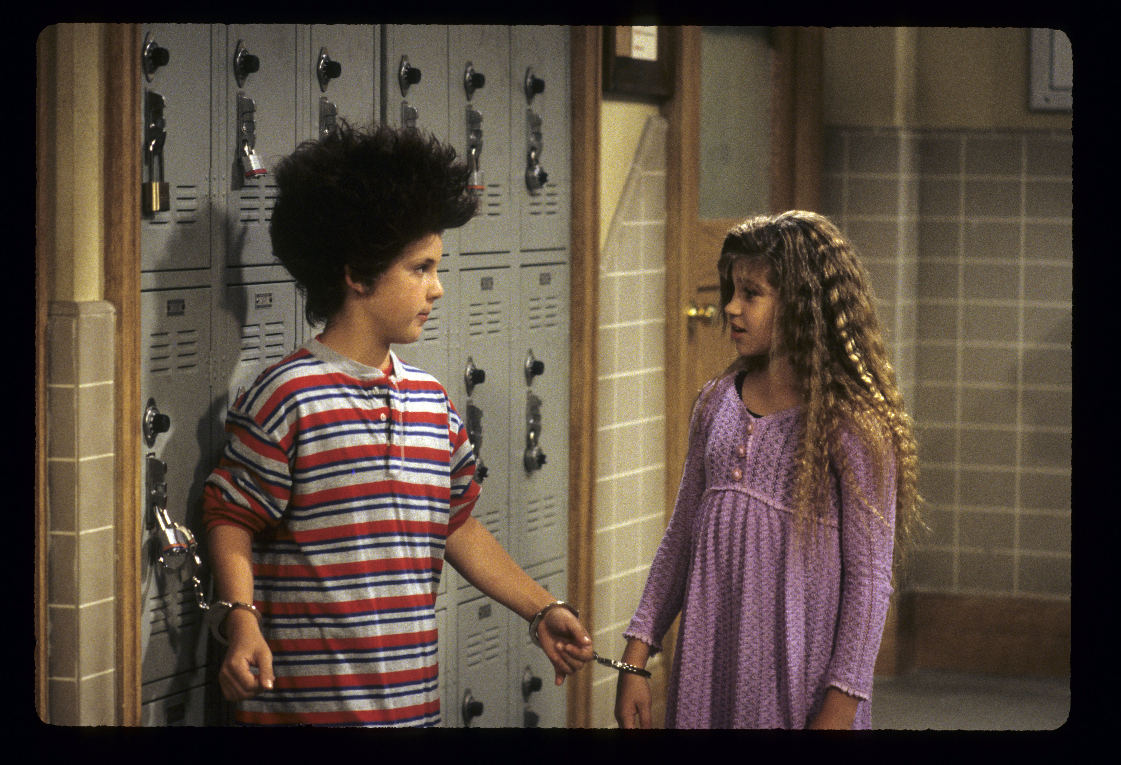 Ben Savage as Cory Matthews with the actress who played Topanga Lawrence, in a "Boy Meets World" episode dated October 15, 1993 | Source: Getty Images