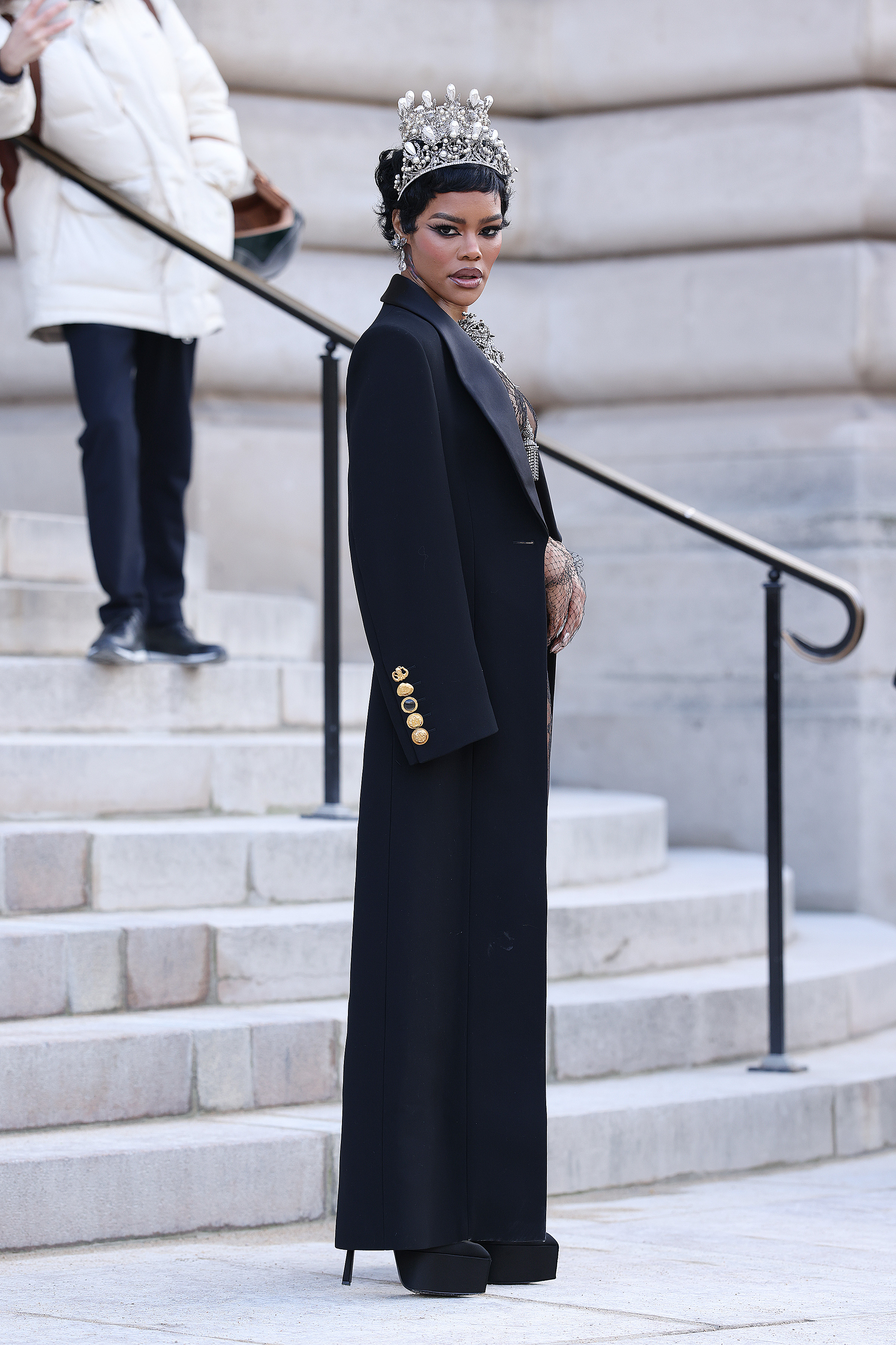 Teyana Taylor posing with grace and poise for the cameras at the fashion show. | Source: Getty Images