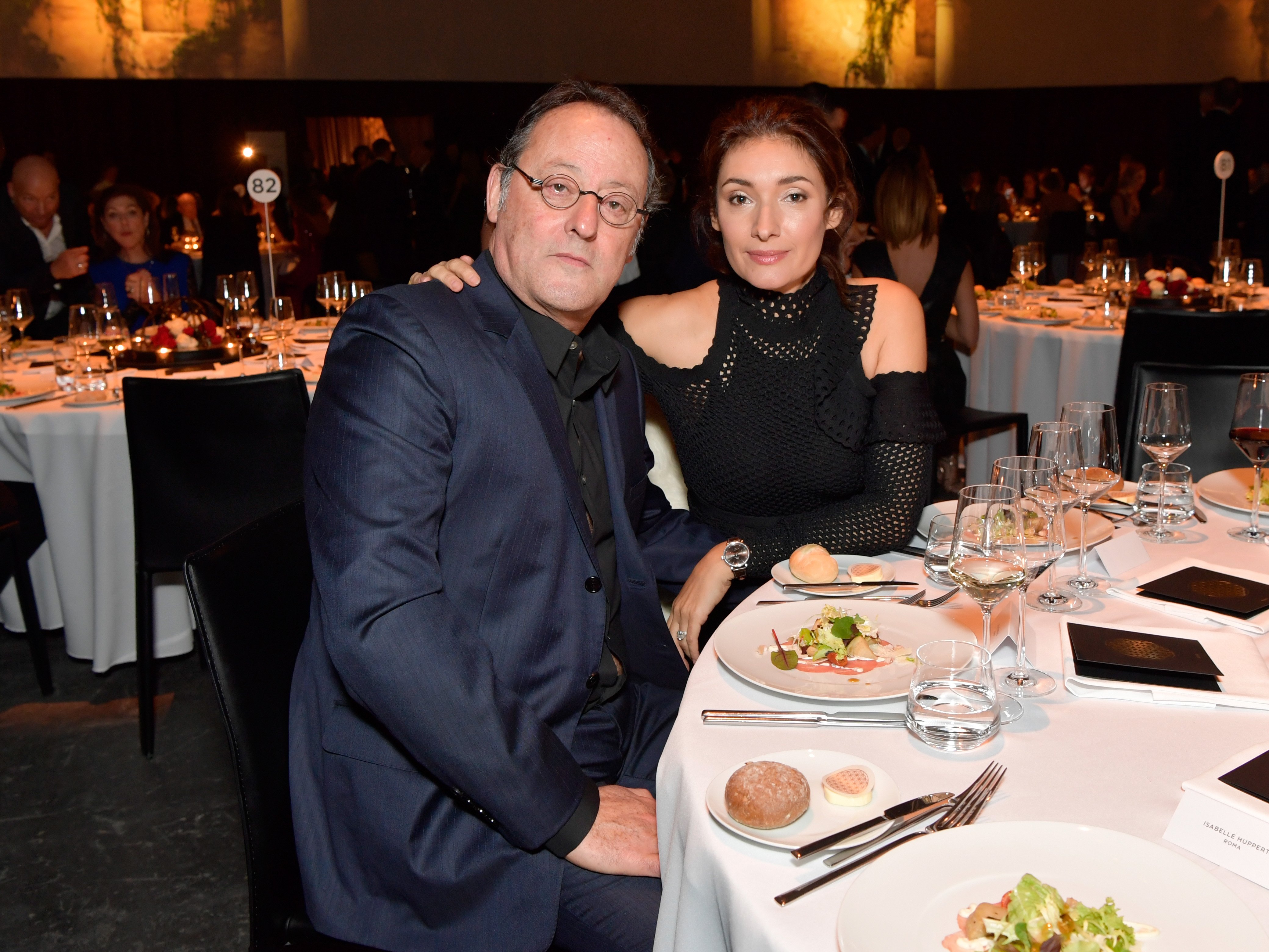 Jean Reno and Zofia Reno attend the IWC Schaffhausen "Decoding the Beauty of Time" Gala Dinner at the Salon International de la Haute Horlogerie (SIHH) on January 17, 2017 in Geneva. | Source: Getty Images