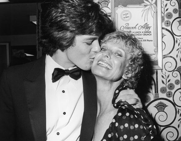 Actress Cloris Leachman being kissed by her son Bryan Englund at unidentified event | Photo: Getty Images
