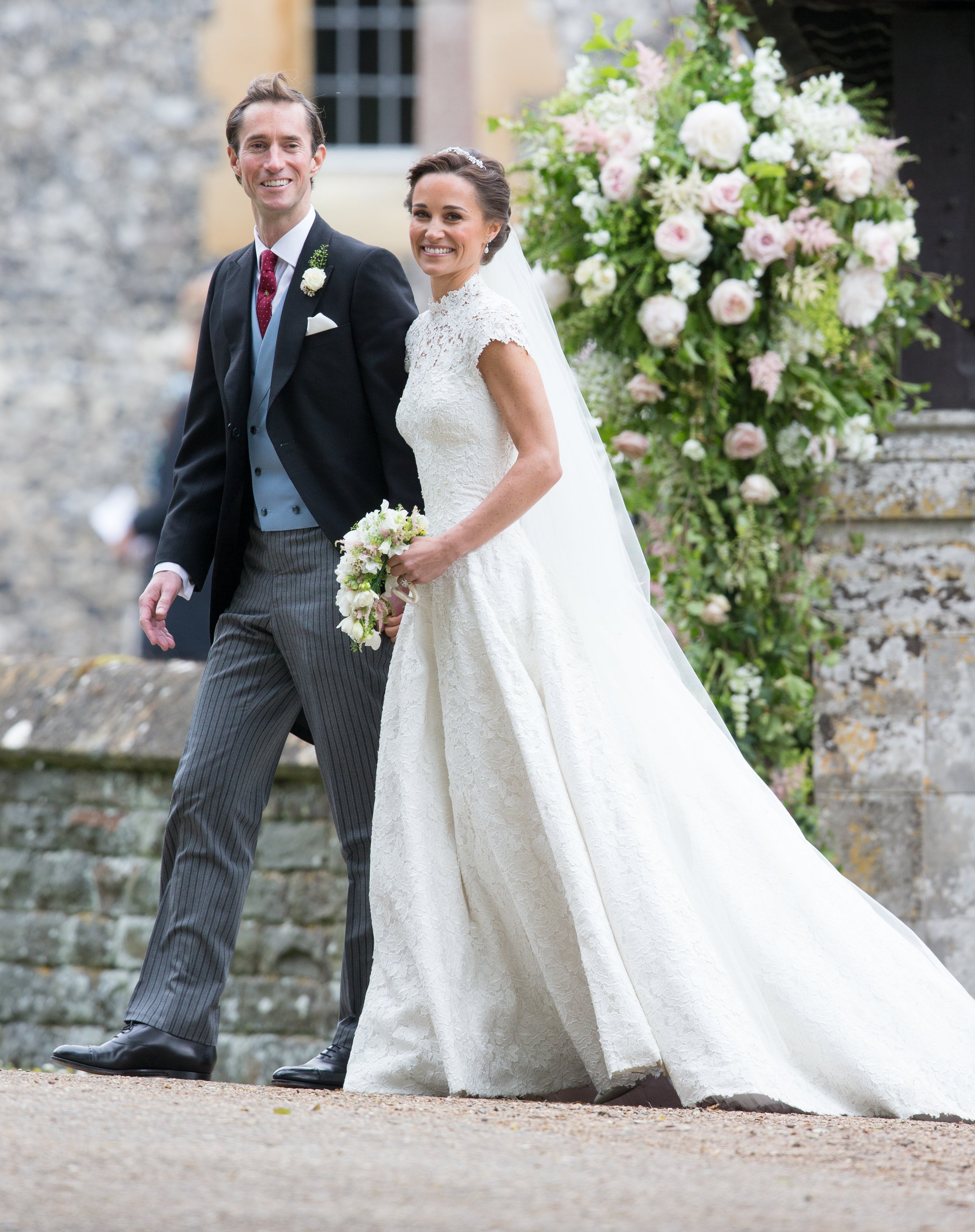 Pippa Middleton and James Matthews pictured leaving after getting married at St Mark's Church on May 20, 2017 in Englefield Green, England ┃Source: Getty Images