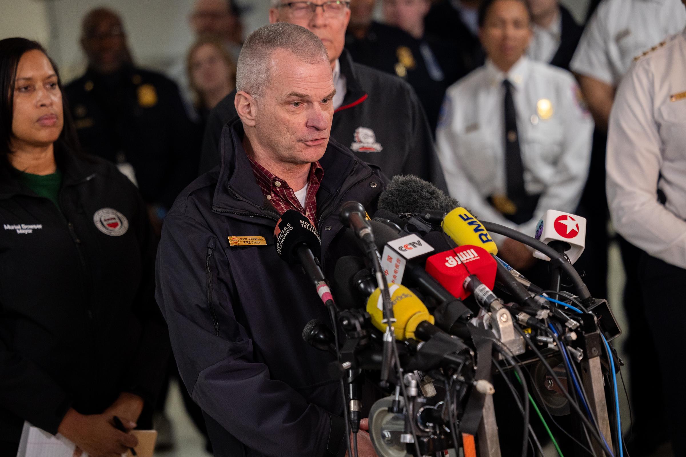 DC Fire and EMS Chief John Donnelly speaking at a press conference with other government officials on the rescue efforts following a collision between an American Airlines plane and an Army helicopter in Washington, D.C. on January 30, 2025 | Source: Getty Images