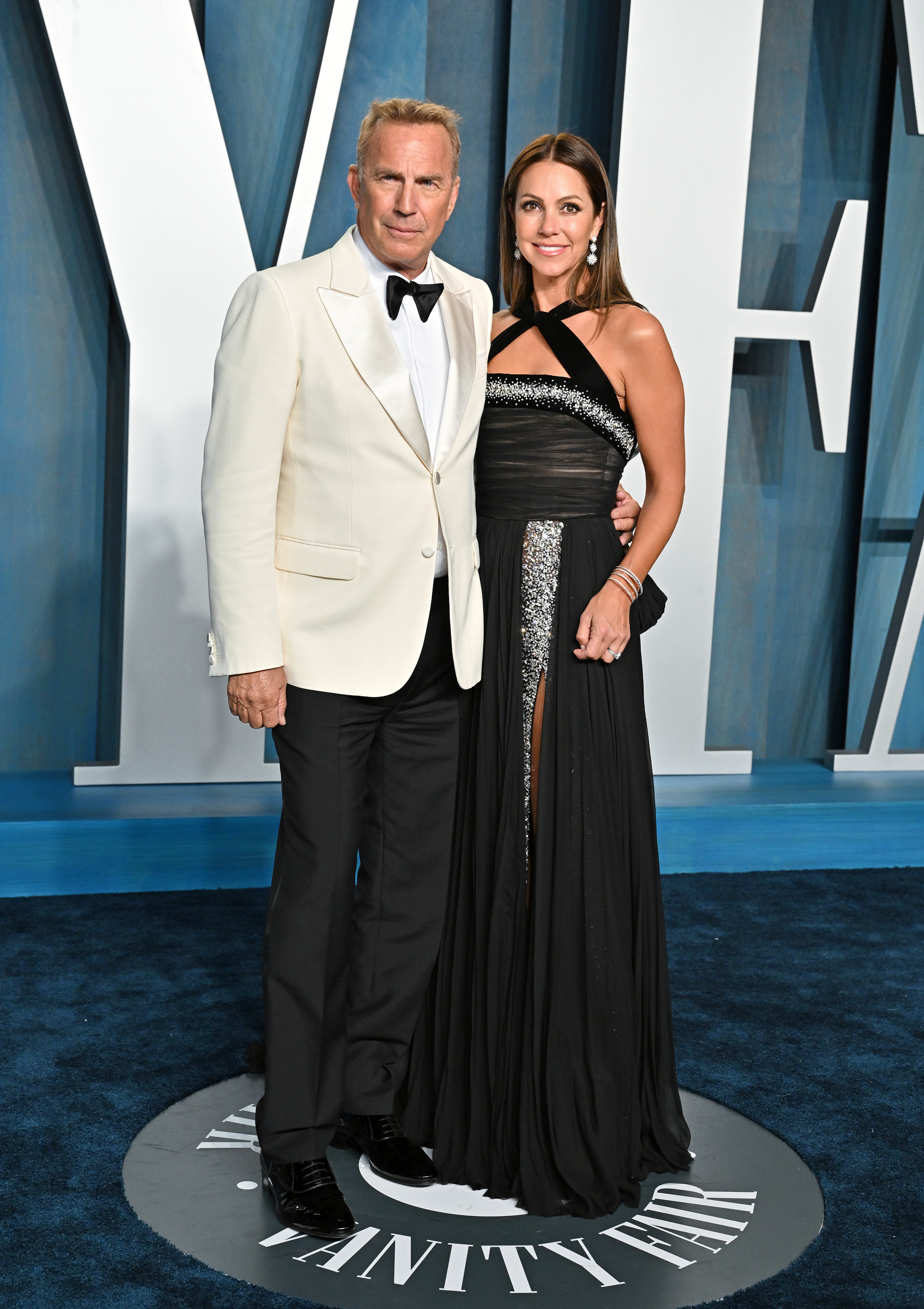 Kevin Costner and Christine Baumgartner at the Vanity Fair Oscar Party in Beverly Hills, California on March 27, 2022 | Source: Getty Images