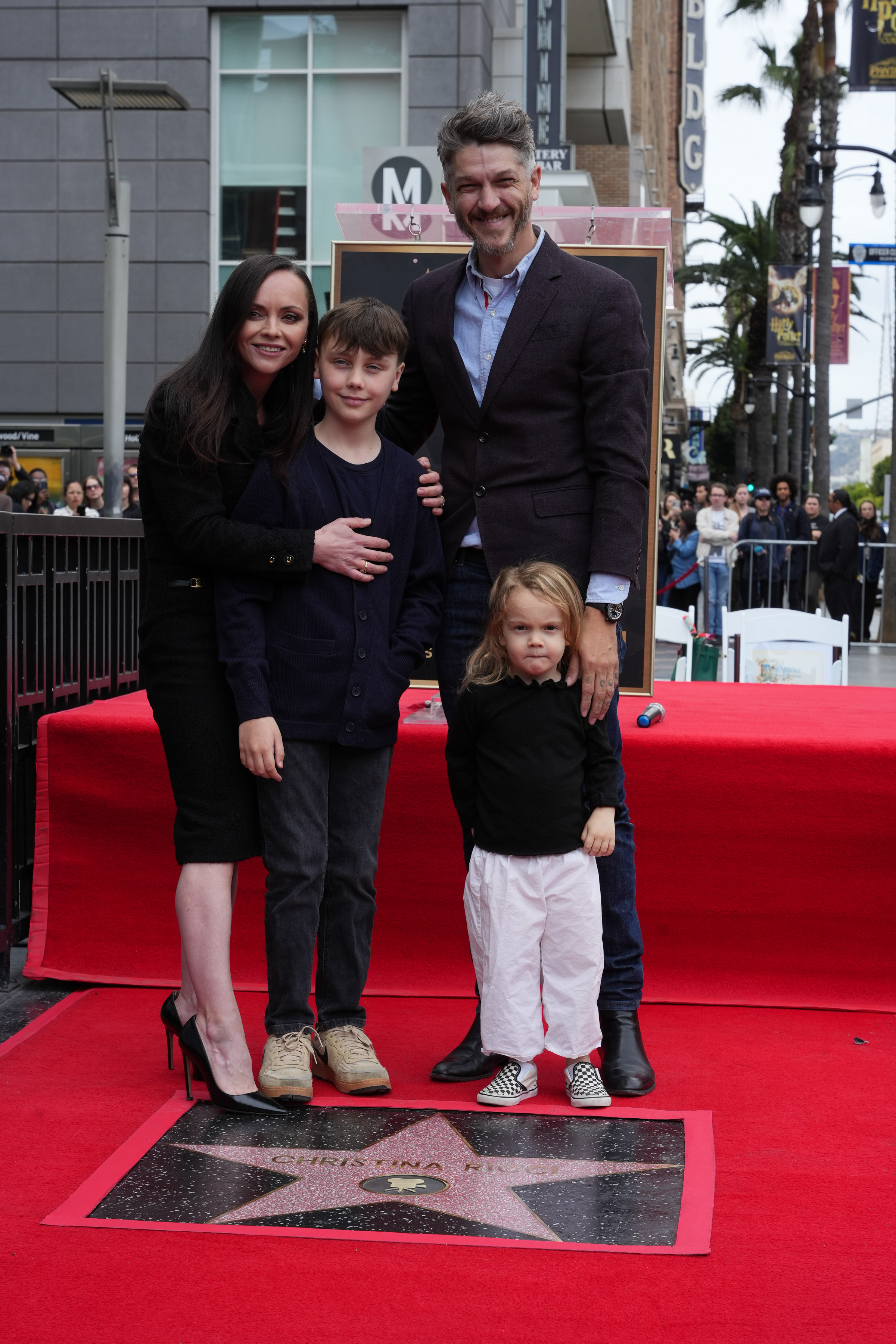 Christina Ricci is seen with her husband Mark Hampton and their two kids at the Hollywood Walk of Fame Star Ceremony Honoring Christina Ricci on March 6, 2025, in Hollywood, California | Source: Getty Images