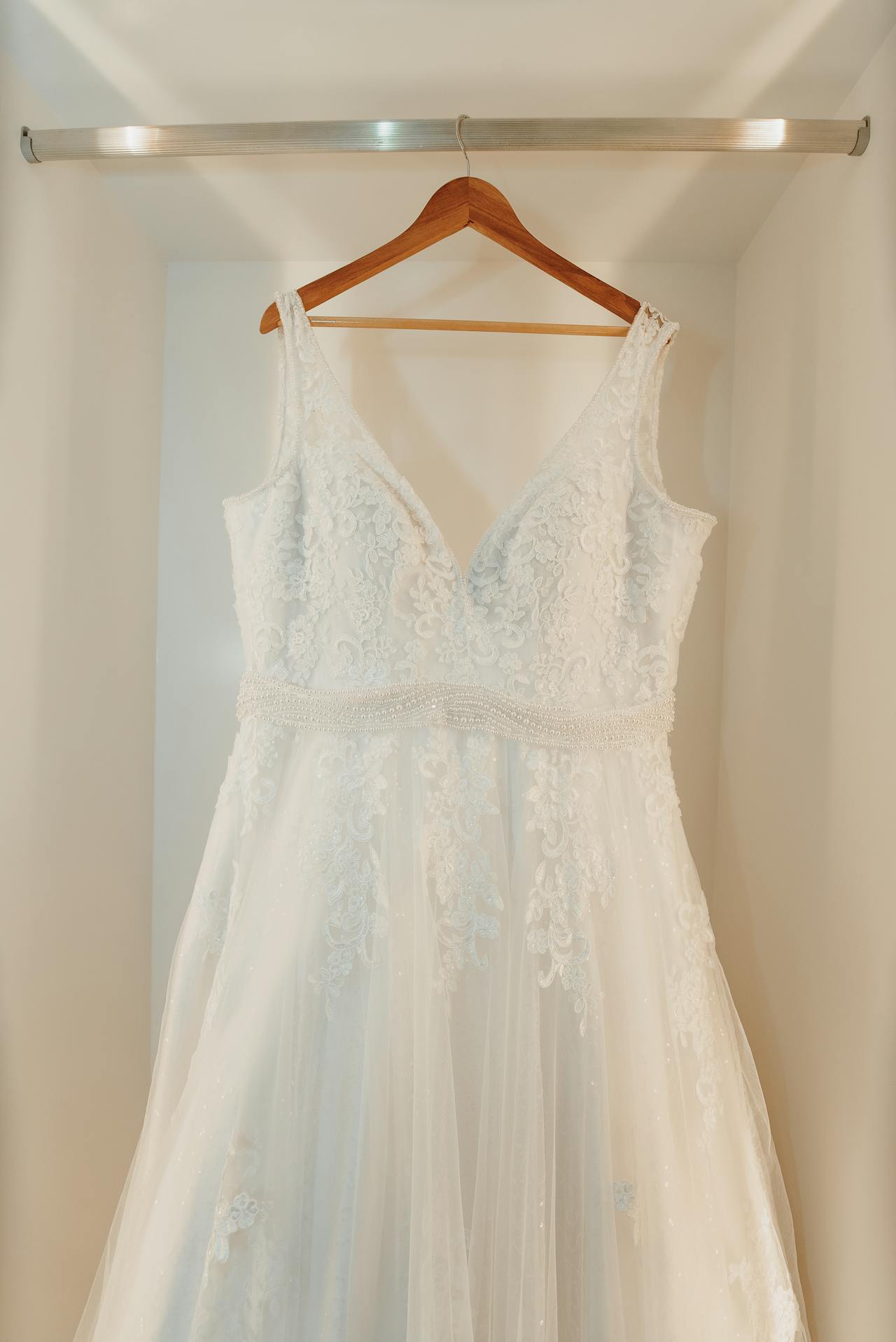 A wedding dress on a hanger | Source: Pexels