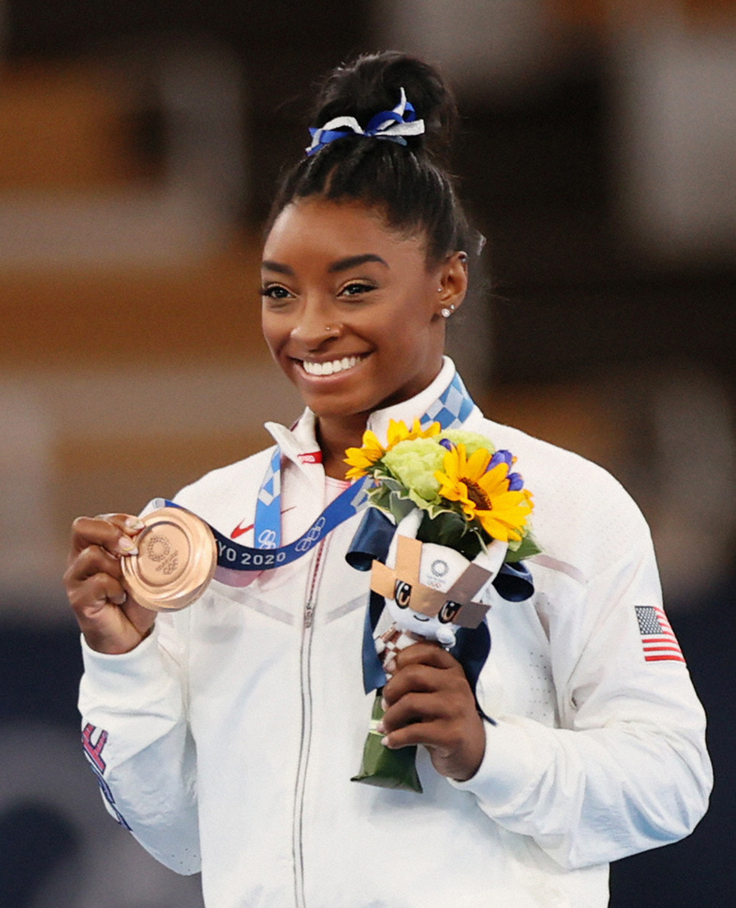 Bronze medalist Simone Biles poses on the podium at the medal ceremony for the Balance Beam on day eleven of the Tokyo 2020 Olympic Games at Ariake Gymnastics Centre on August 3, 2021 in Tokyo, Japan | Source: Getty Images