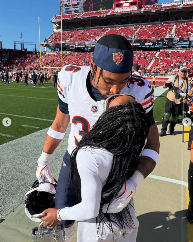 Jonathan Owens and Simone Biles share a kiss during one of his games in a post uploaded on December 16, 2024 | Source: Instagram/simonebiles