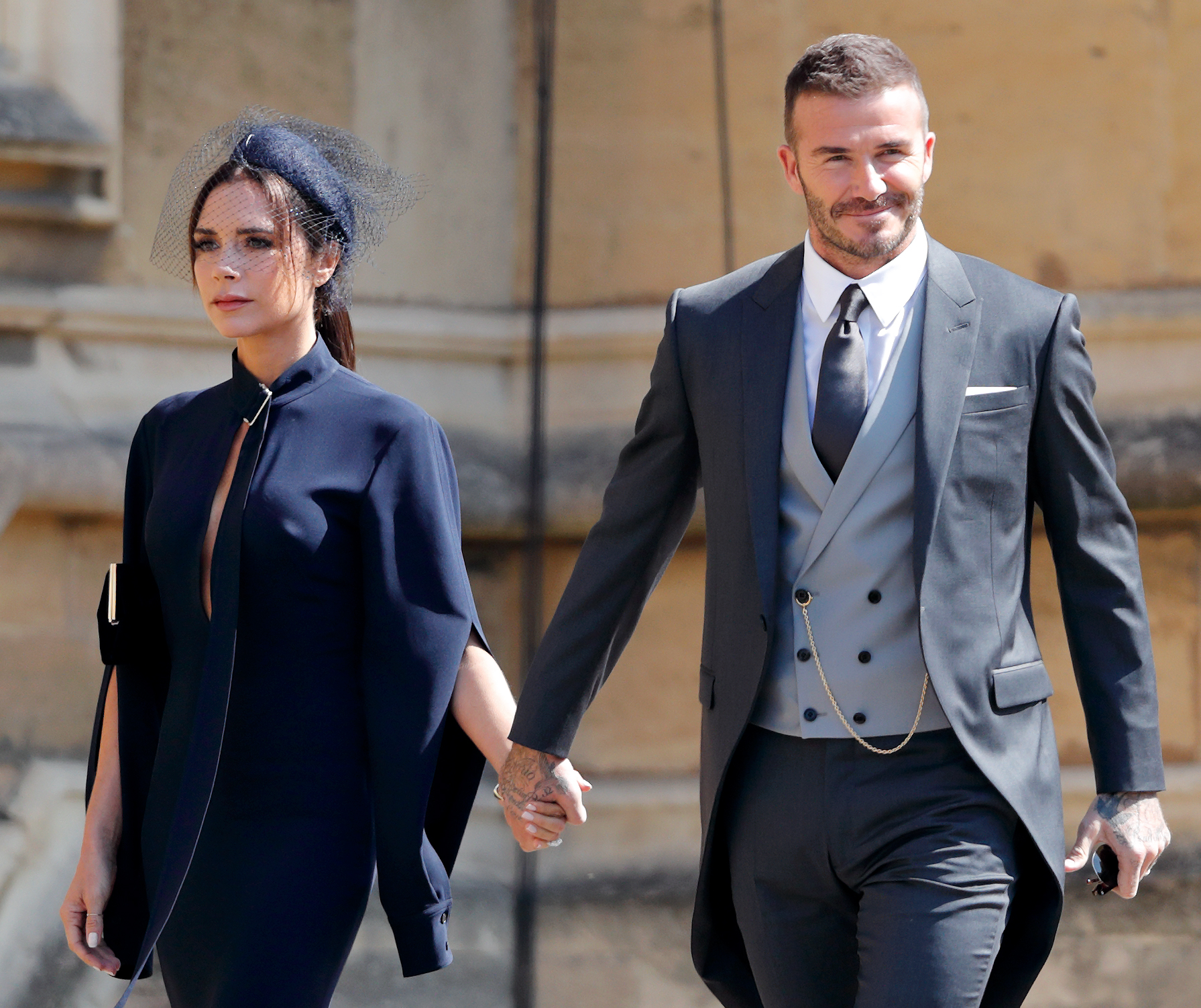 Victoria Beckham and David Beckham in Windsor, England, on May 19, 2018| Source: Getty Images