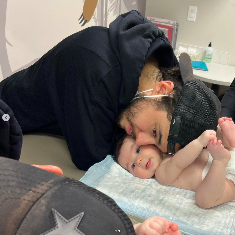 Johnny Gaudreau sharing a tender moment with one of his kids, posted on January 28, 2023 | Source: Instagram/meredithgaudreau_