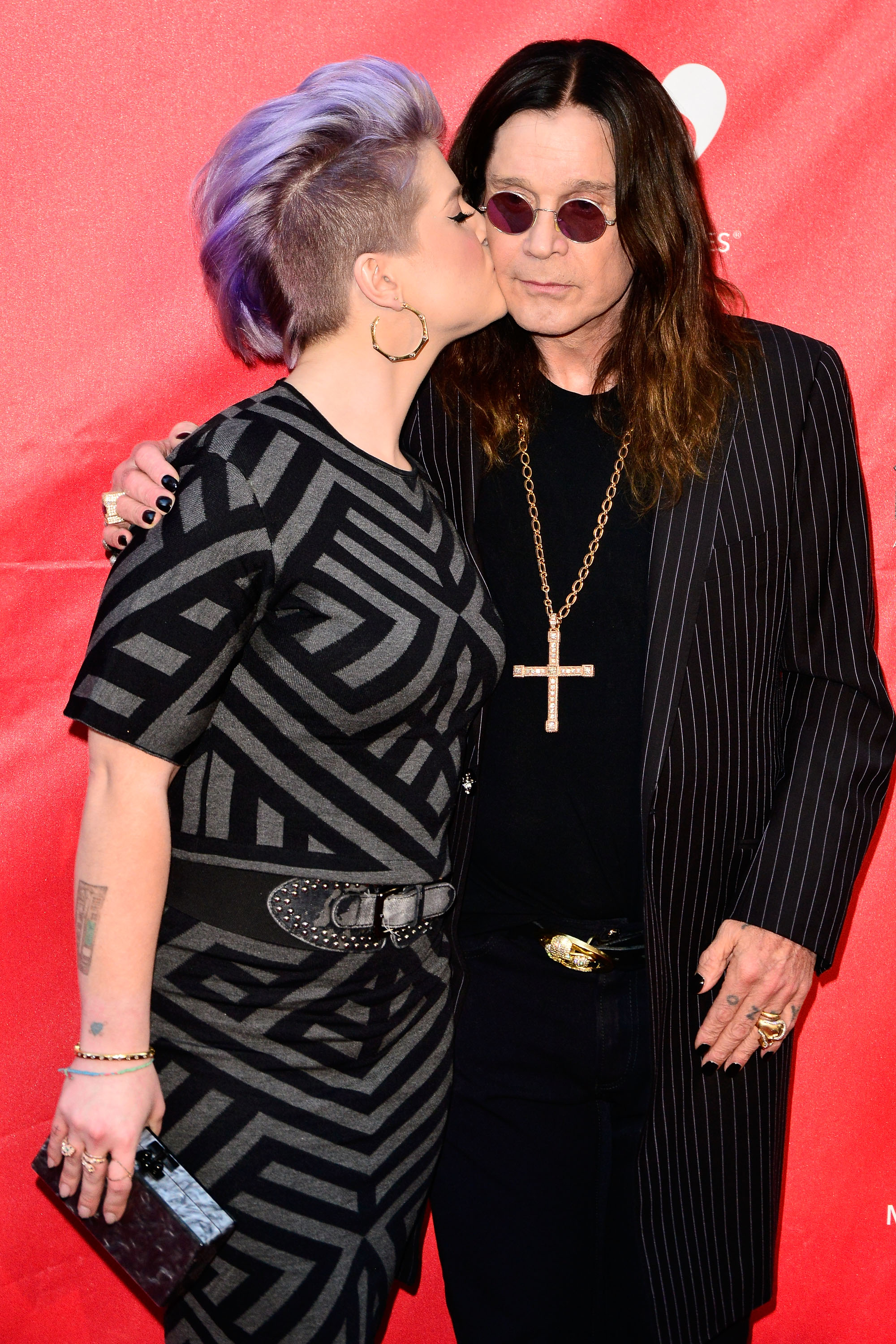 Kelly Osbourne with father Ozzy Osbourne, 2014 | Source: Getty Images