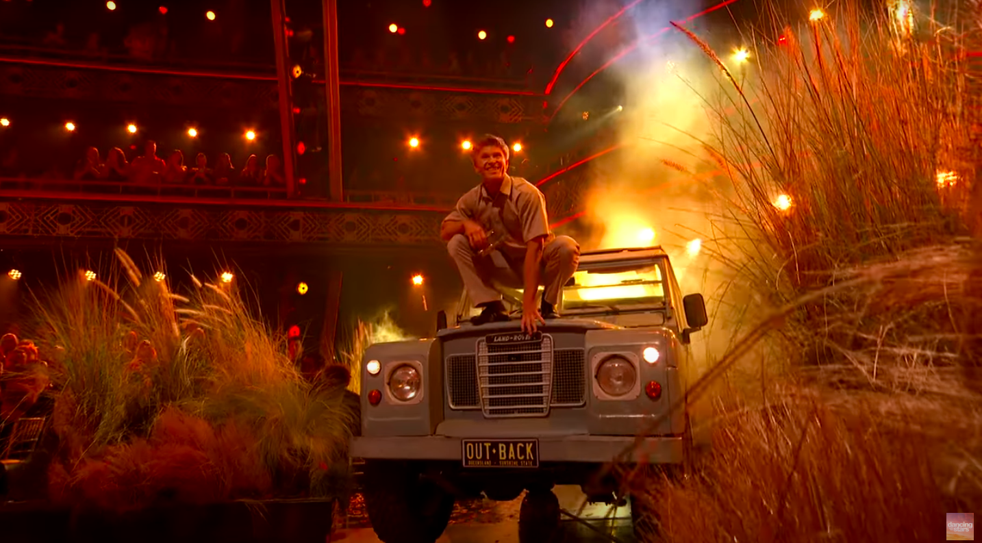 Robert Irwin perched on top of a Land Rover right before beginning the jive with dance partner Witney Carson, posted on September 17, 2025. | Source: YouTube/Dancing With The Stars