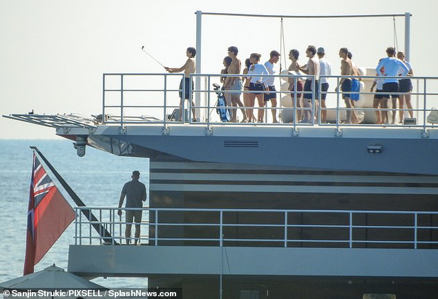 Young guests appeared to hold a golf club at they celebrated on the yacht