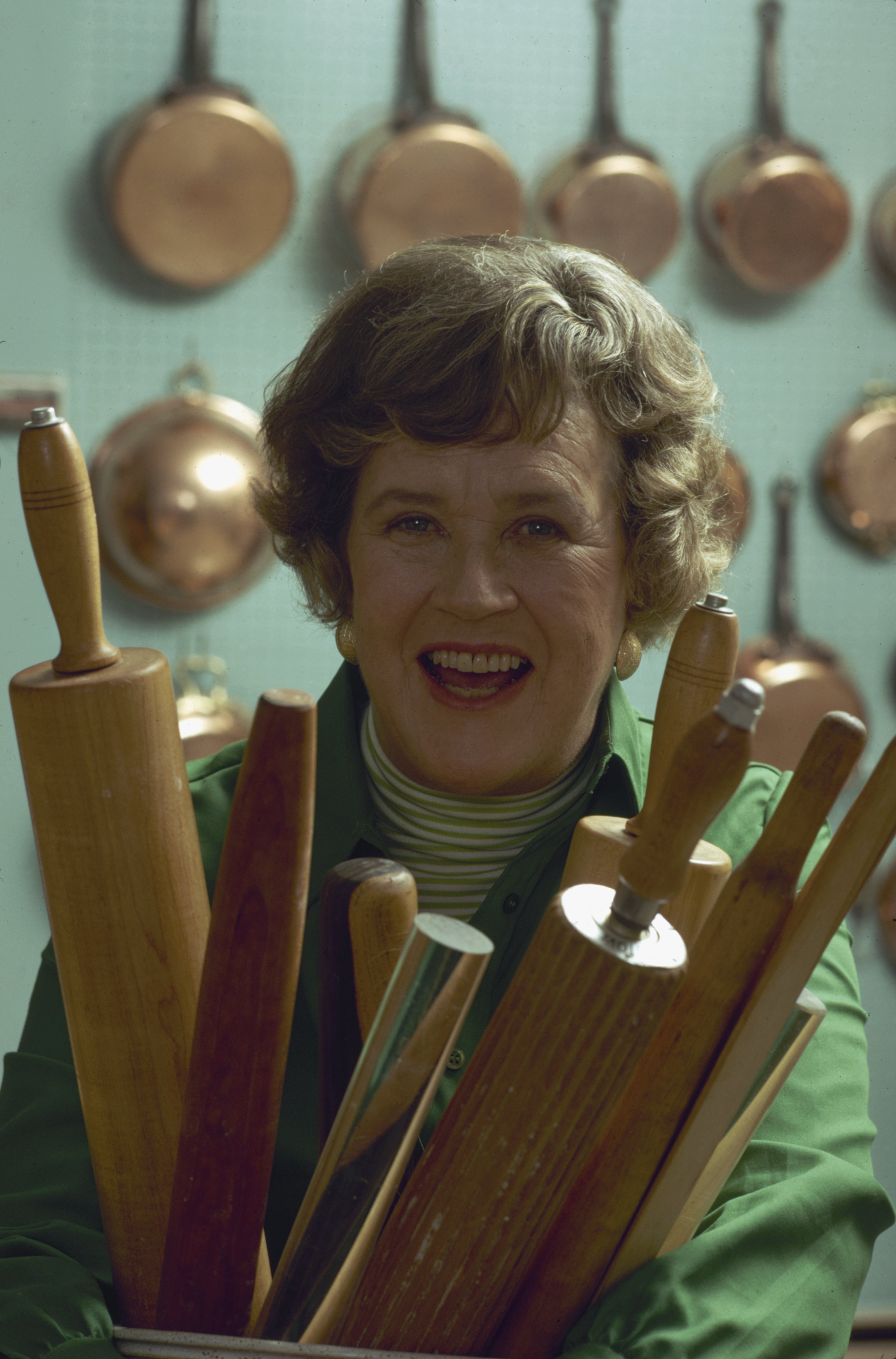 An undated picture of cooking teacher Julia Child posing with assorted rolling pins while smiling. Photo: Getty Images