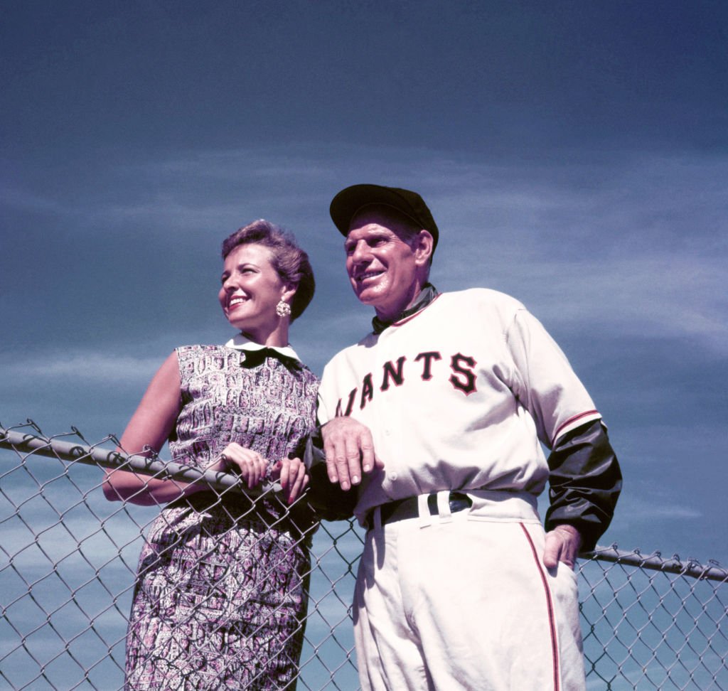 Manager Leo Durocher of the New York Giants with Laraine Day on March 2, 1955 in Phoenix, Arizona | Source: Getty Images