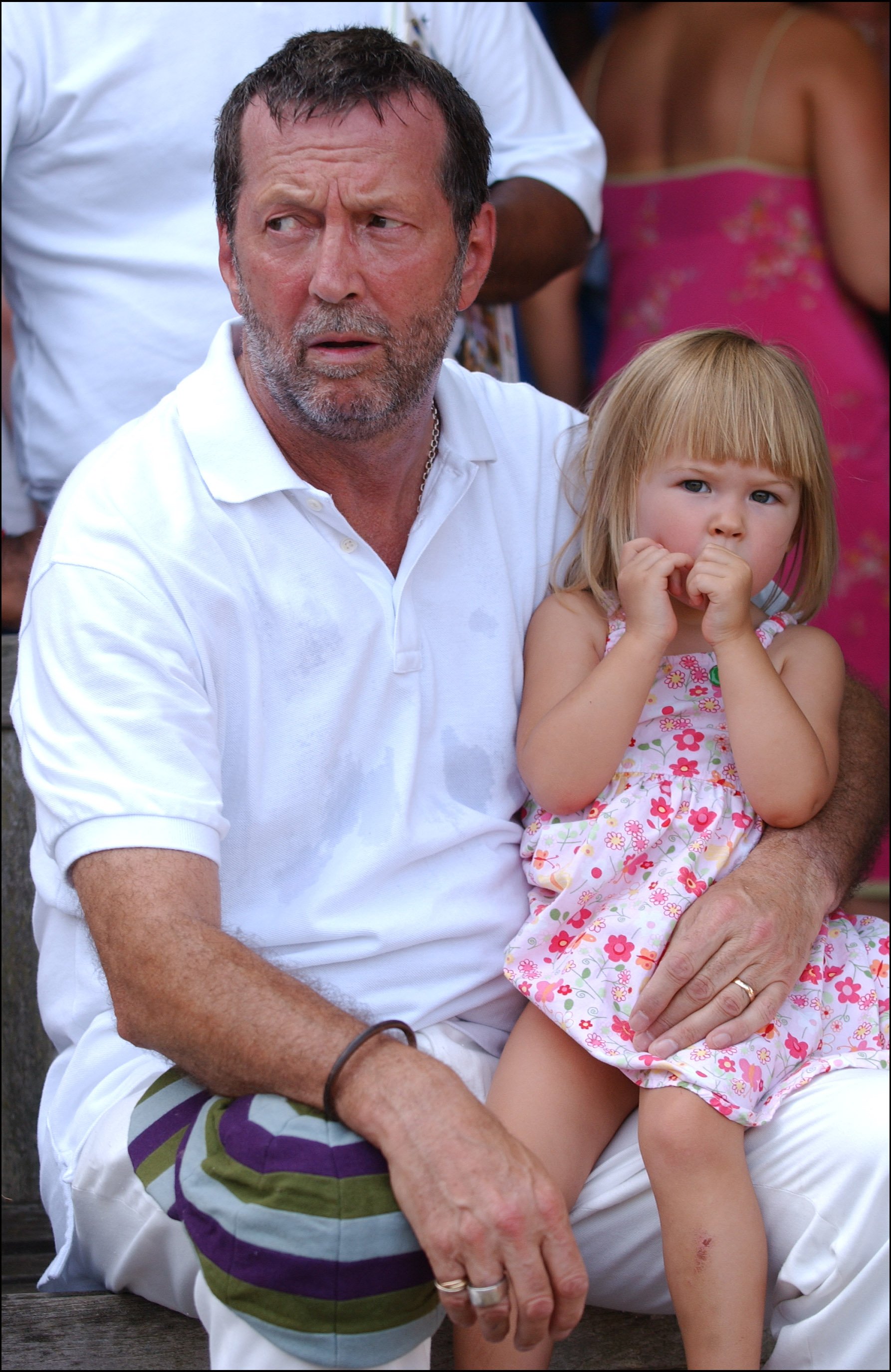 Eric Clapton with his daughter at a Bunbury Cricket Club charity cricket match on August 10 2003. | Source: Getty Images