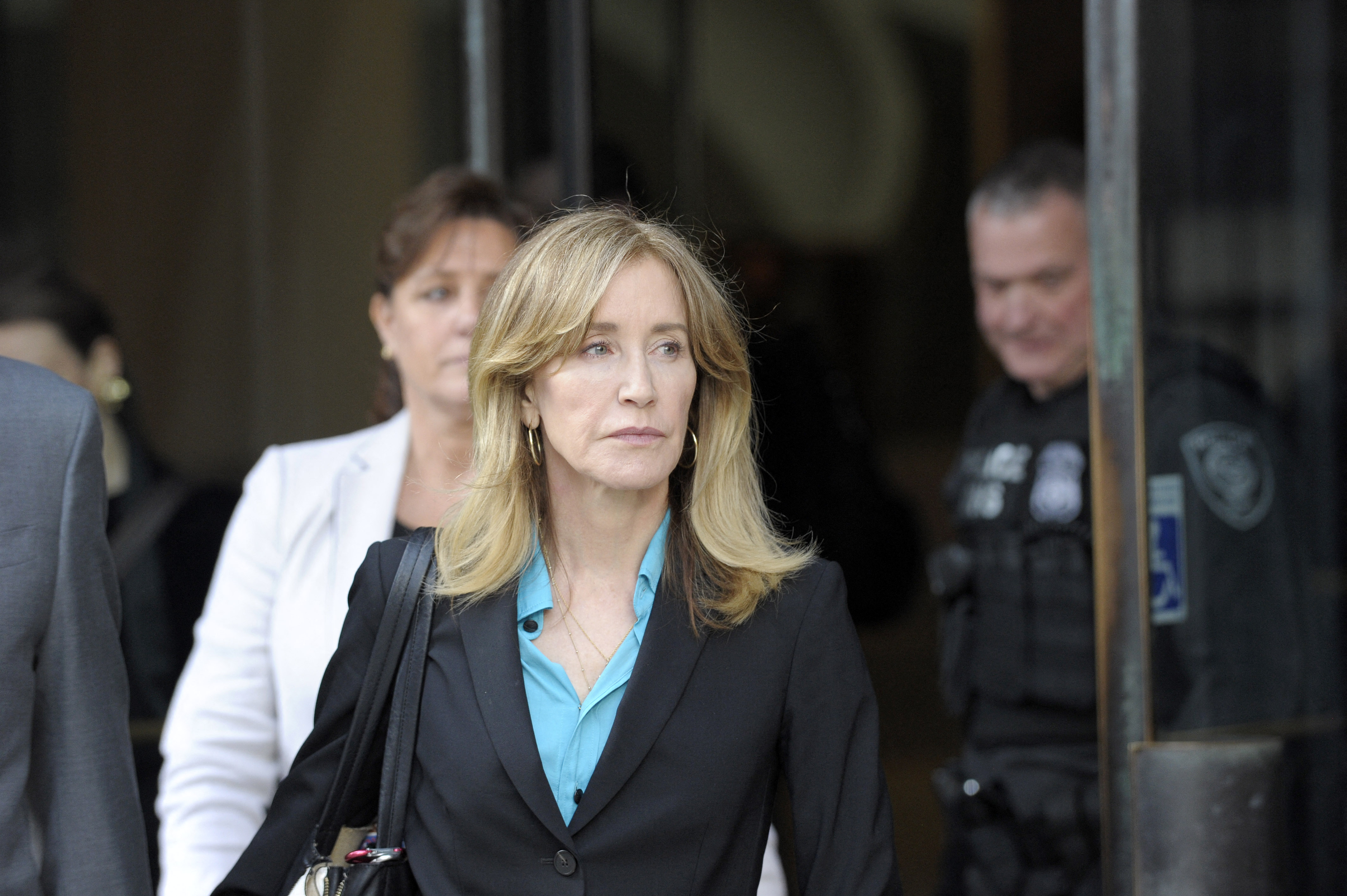 Felicity Huffman exits the courthouse on April 3, 2019 in Boston, Massachusetts. | Source: Getty Images