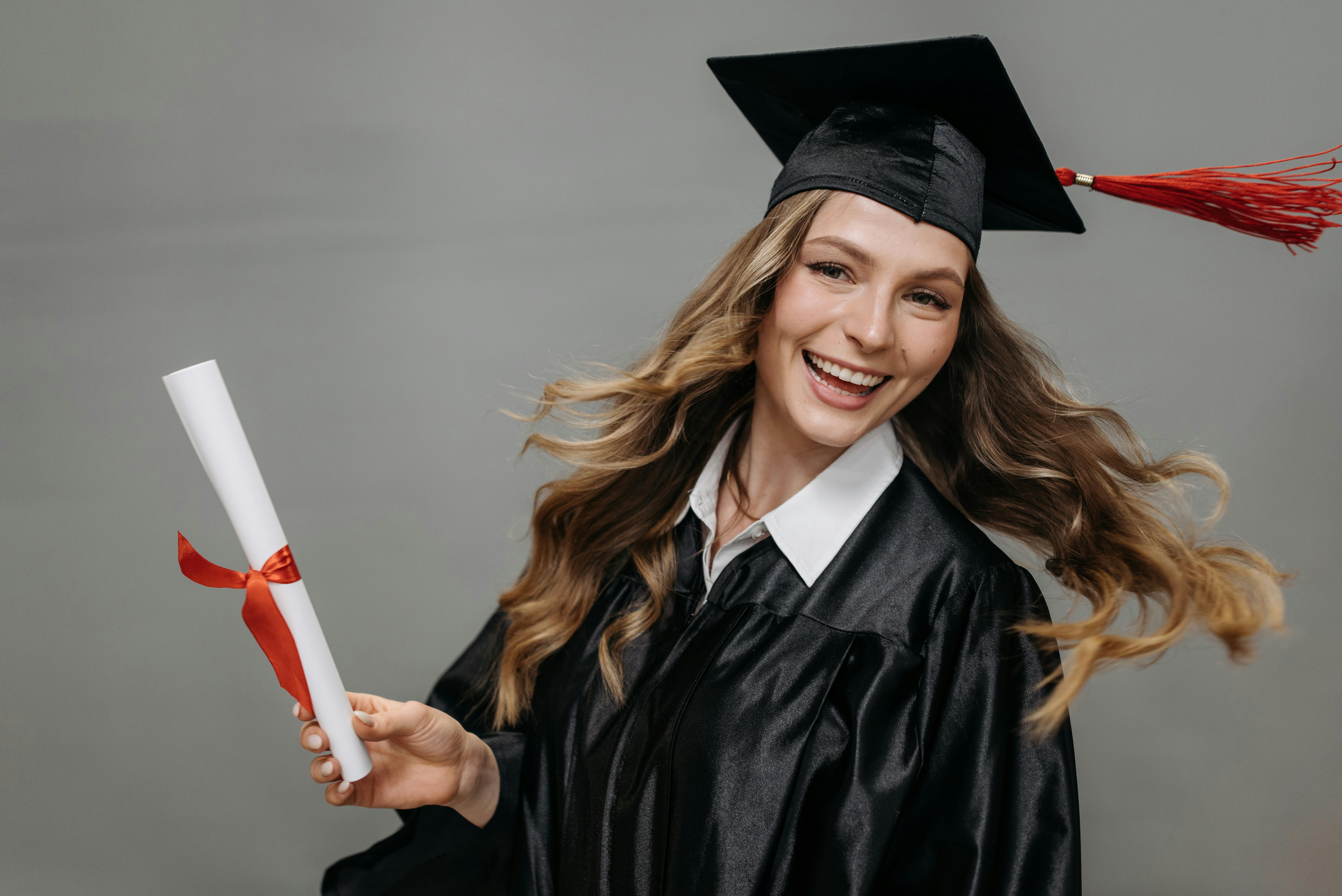 A woman pictured on graduation day | Source: Pexels