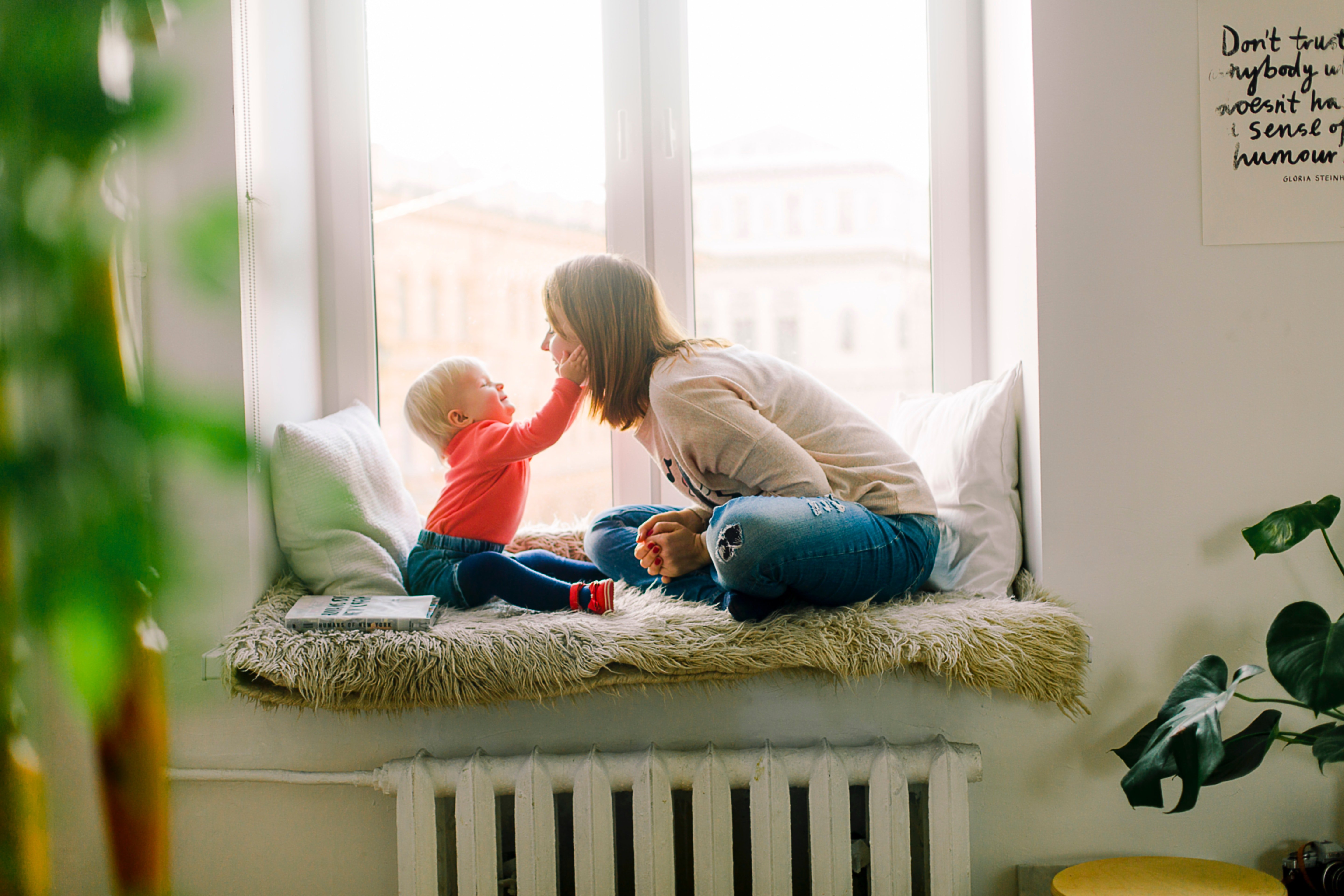 A baby touching his mother's face. | Source: Pexels