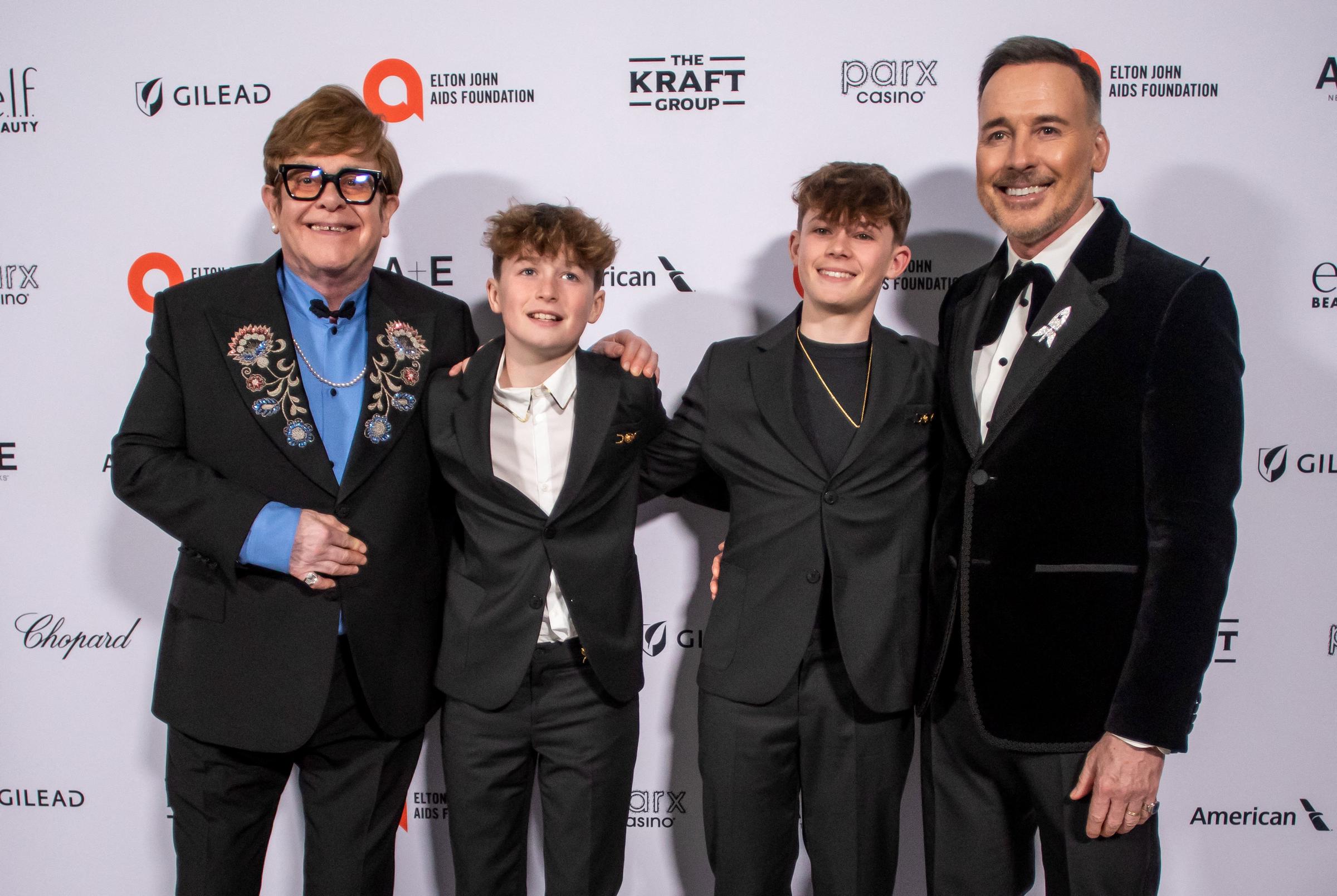 Elton John and David Furnish with their sons Zachary Jackson and Elijah Joseph Daniel Furnish-John at the 33rd Annual Elton John AIDS Foundation Academy Awards Viewing Party in Hollywood, California on March 2, 2025. | Source: Getty Images