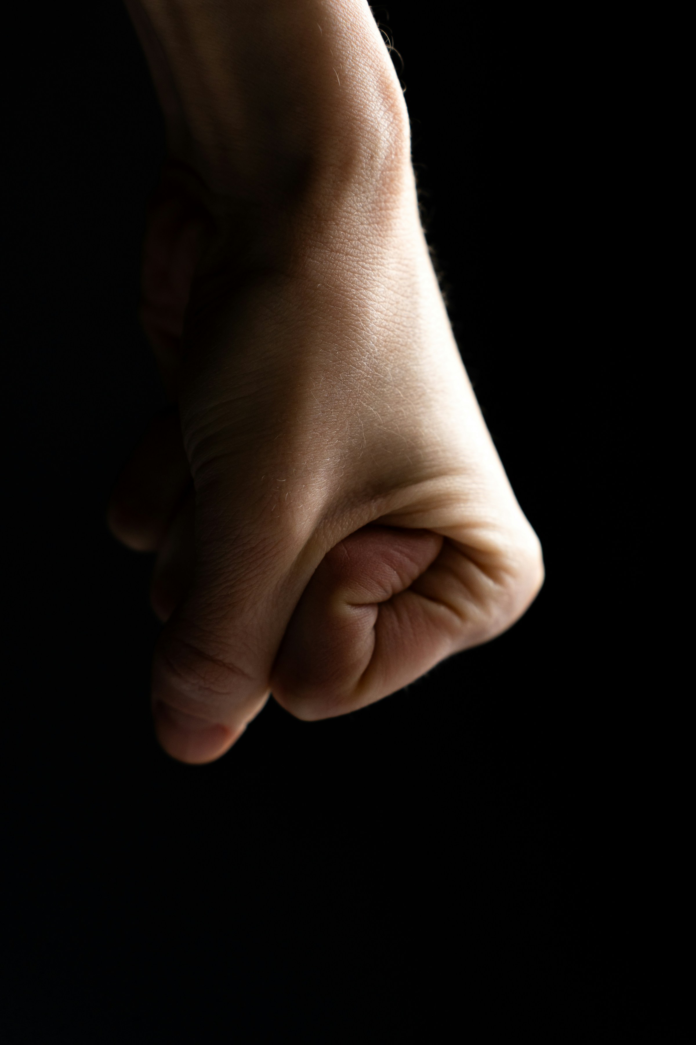 Close-up of a clenched fist | Source: Unsplash