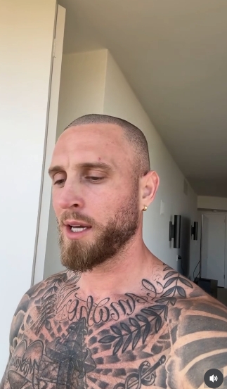 Chet Hanks showed off his closely shaved head, beard, and extensive chest and shoulder tattoos while speaking to the camera. | Source: Instagram/chethanx