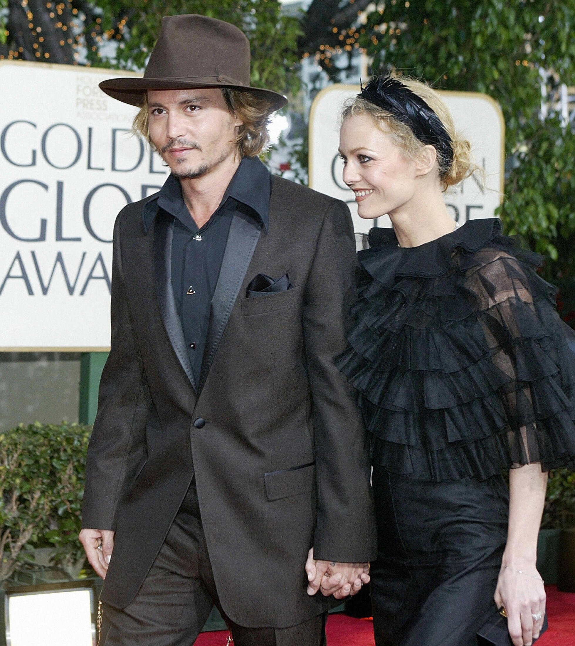 Johnny Depp and French singer Vanessa Paradis arriving for the 61st Golden Globe awards on January 25, 2004 in Beverly Hills, California. / Source: Getty Images