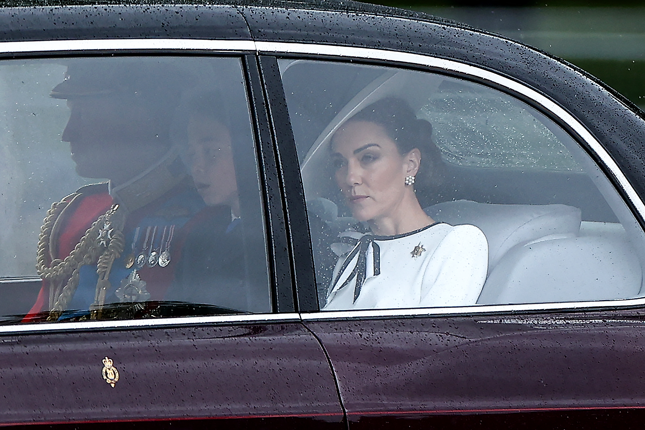 Prince William, Prince of Wales, Catherine, Princess of Wales, and Prince George of Wales on their way to Buckingham Palace before the King's Birthday Parade "Trooping the Colour" in London on June 15, 2024. | Source: Getty Images