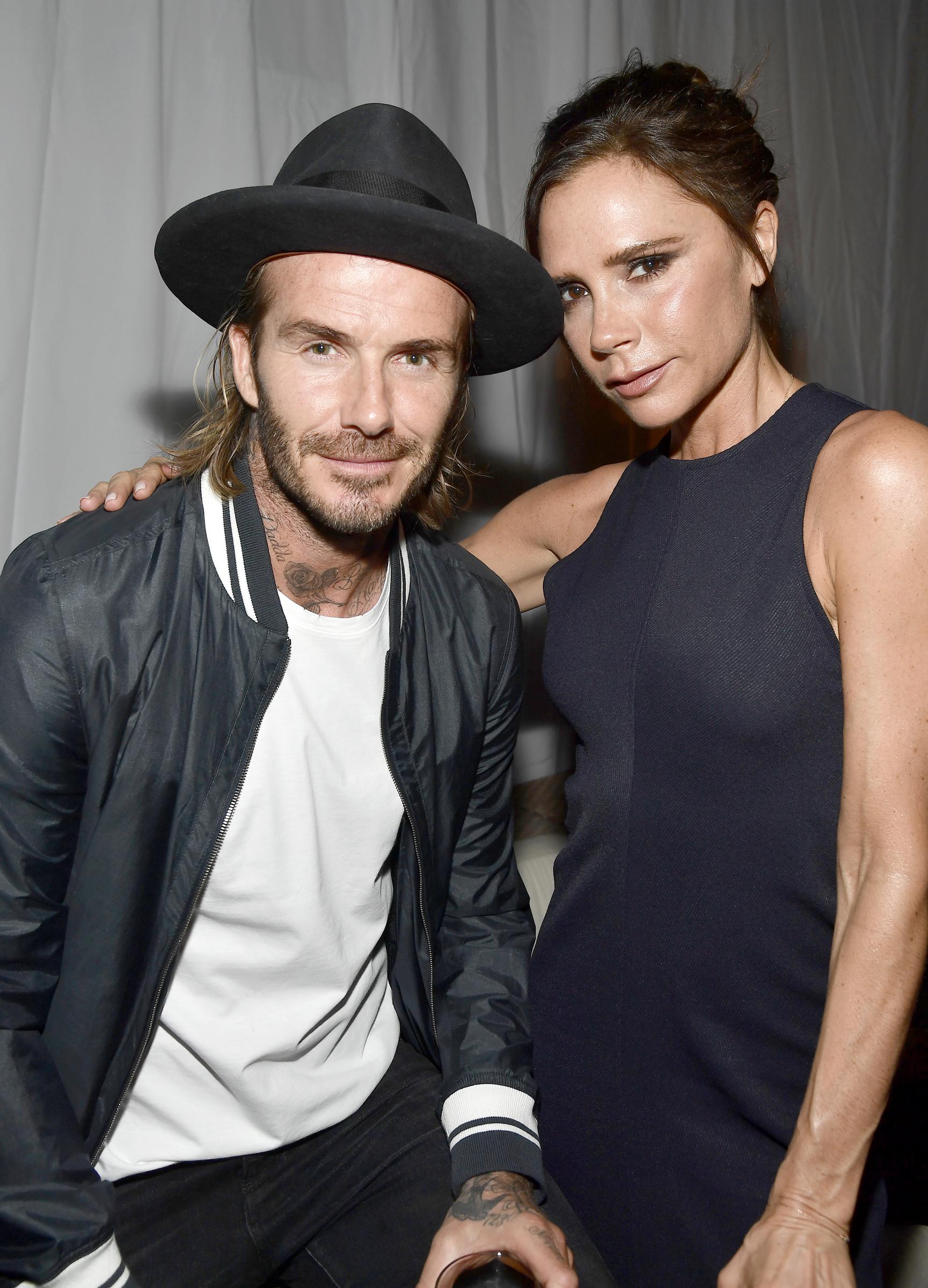 David and Victoria Beckham at the grand opening of the Ken Paves Salon hosted by Eva Longoria on October 23, 2017, in Los Angeles, California | Source: Getty Images