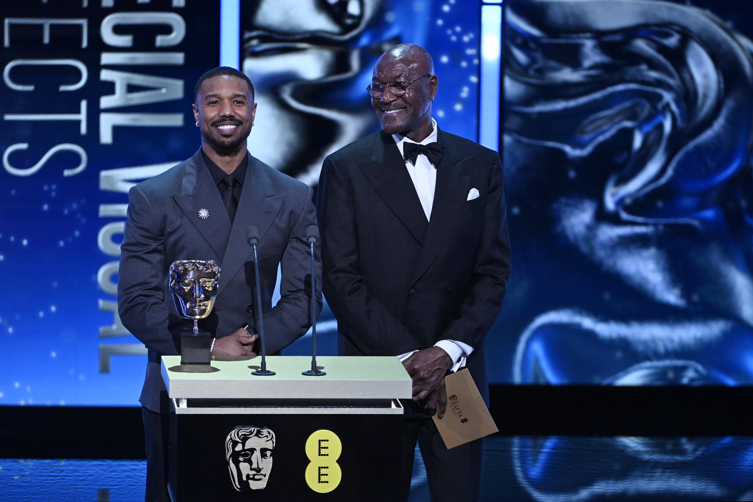 Michael B. Jordan and Delroy Lindo present the Special Visual Effects Award on stage during the 79th BAFTA Film Awards at The Royal Festival Hall on February 22, 2026, in London, England | Source: Getty Images