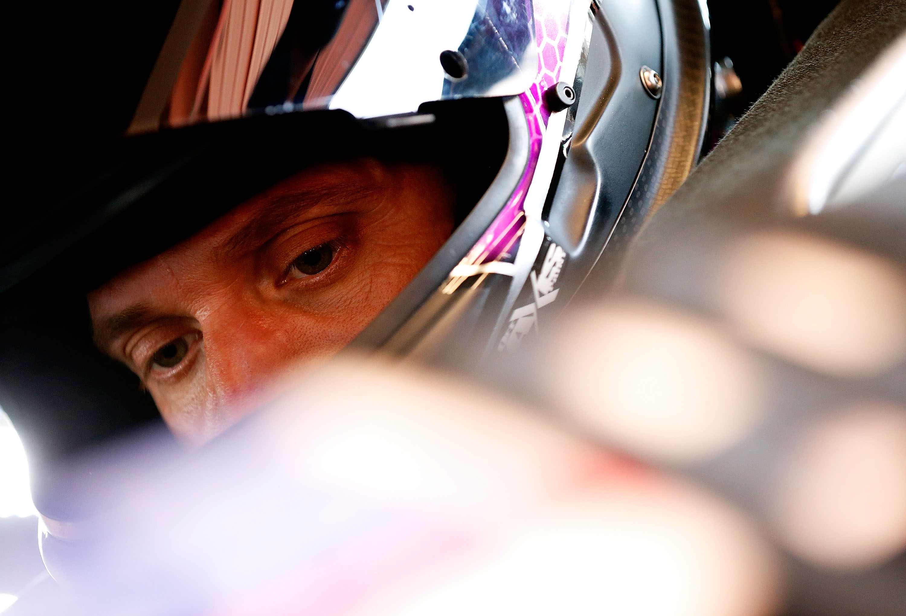 Chase Pistone sits in his car during practice at Iowa Speedway in Newton, Iowa, on August 1, 2014 | Source: Getty Images