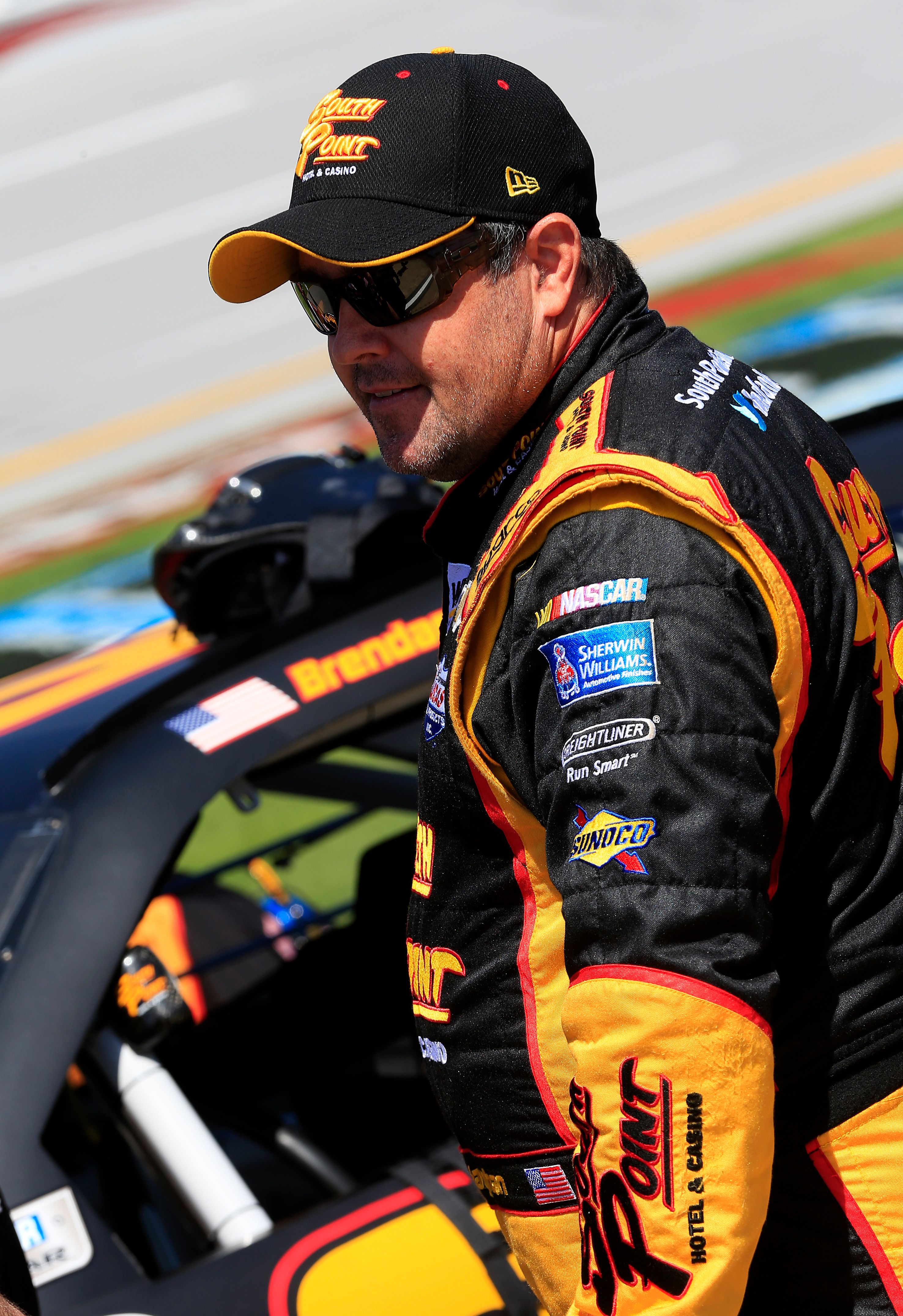 Brendan Gaughan, driver of the #62 South Point Chevrolet, stands on the grid at qualifying for the NASCAR XFINITY Series Winn Dixie 300 at Talladega Superspeedway on May 2, 2015 | Photo: Getty Images