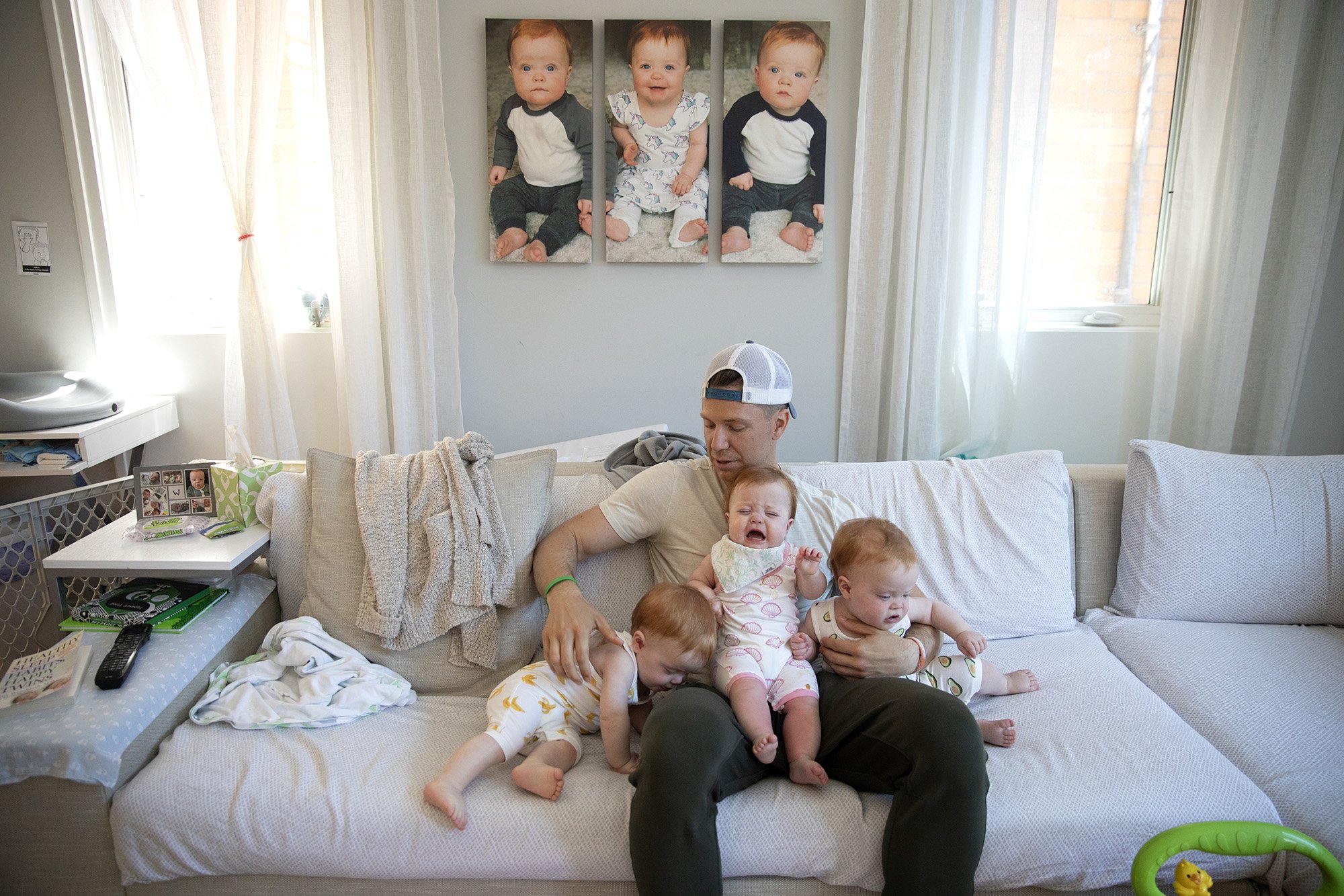 Charlie Whitmer and his triplets. | Source: Getty Images