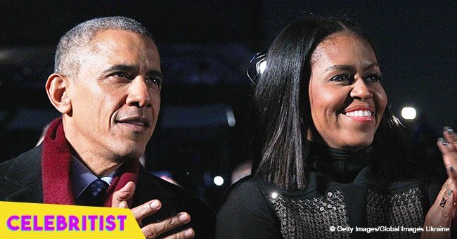 Barack & Michelle Obama cause a stir as they bust out dance moves at Beyoncé & Jay-Z concert