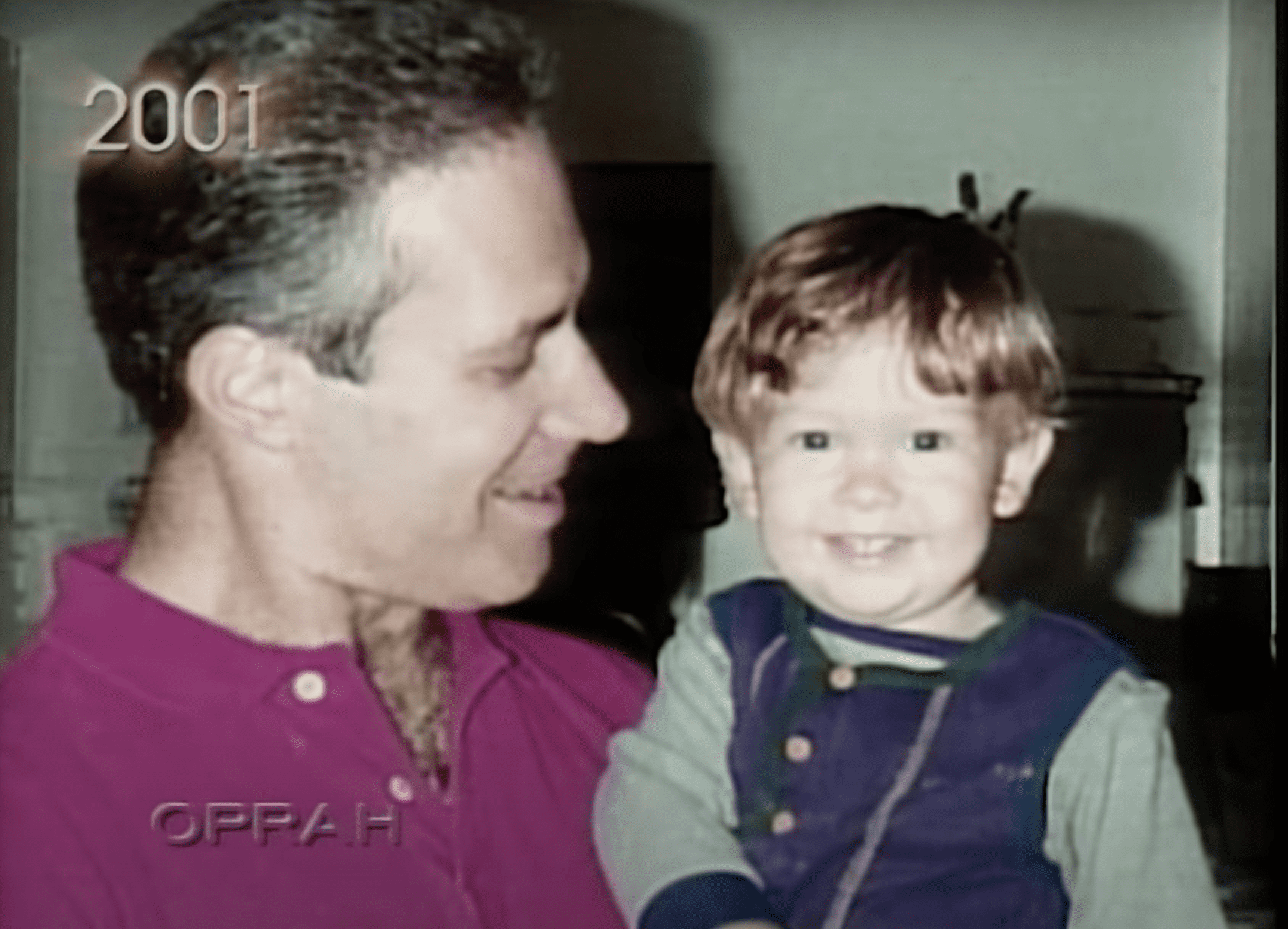 Ben Goeller pictured holding his son, Bryan. | Source: youtube.com/OWN