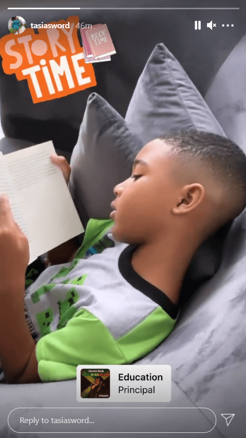 Fantasia Barrino's son Dallas reading a book. |  Source: Instagram.com/tasiasword 