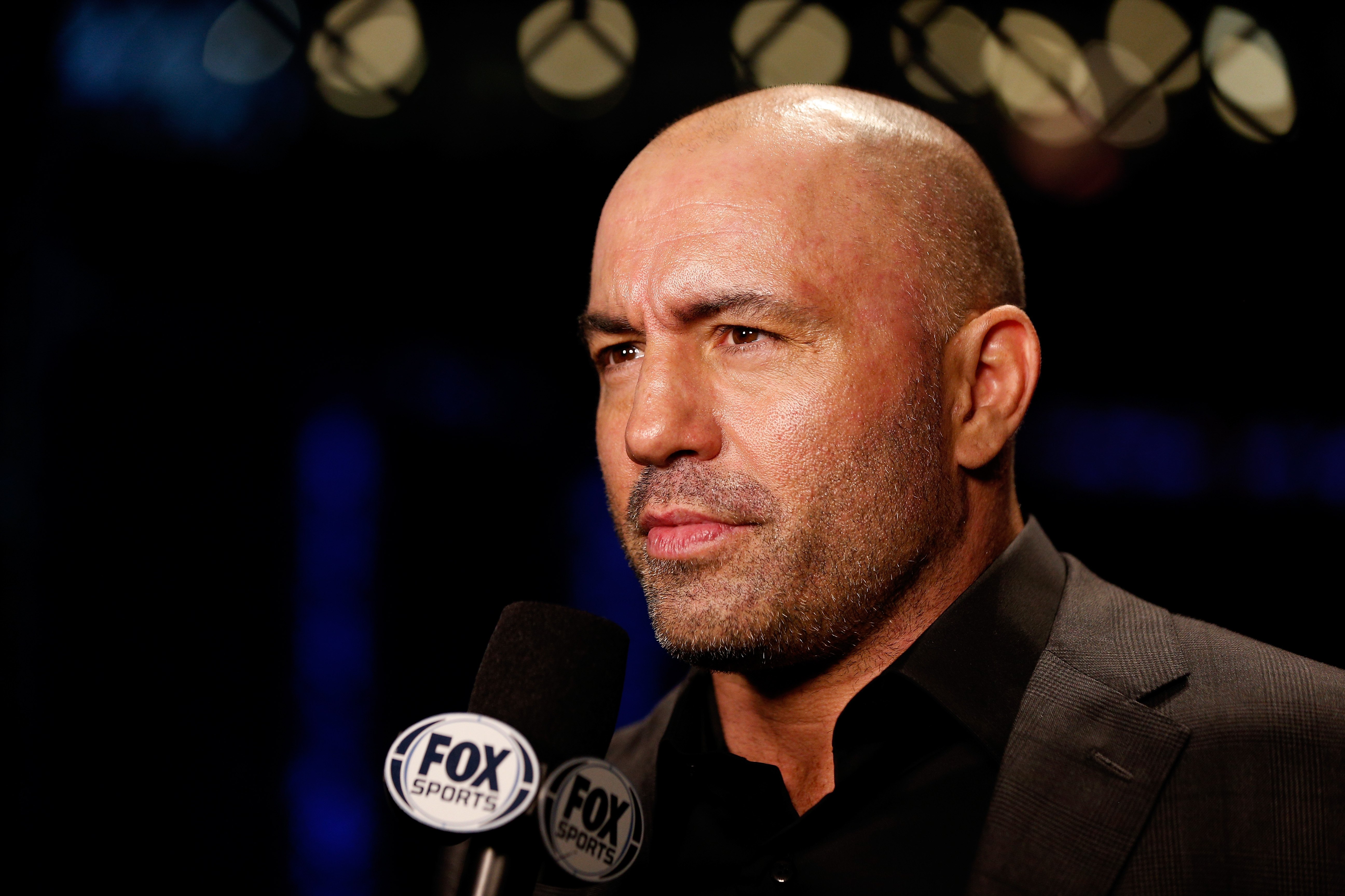 Joe Rogan speaks on camera during the FOX UFC Saturday event at the Amway Center on April 19, 2014, in Orlando, Florida. | Source: Getty Images